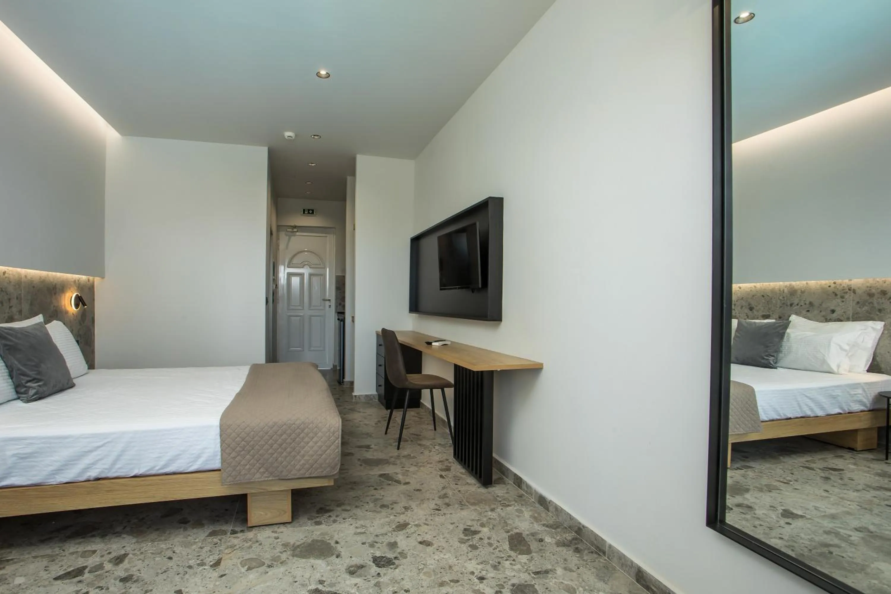 Bed in Dias Studios & Suites