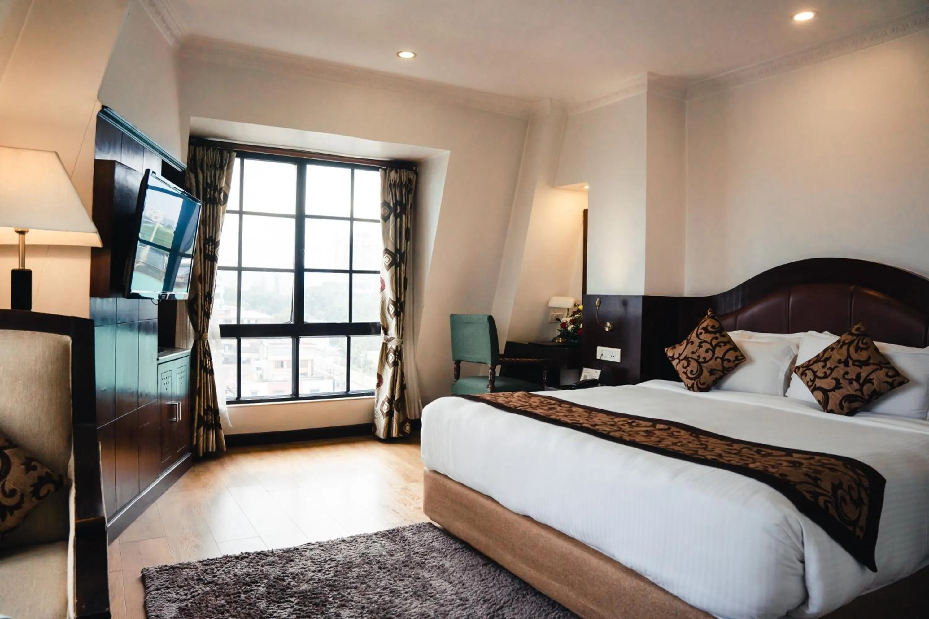 Bed in Maya Manor Boutique Hotel by KGH Group