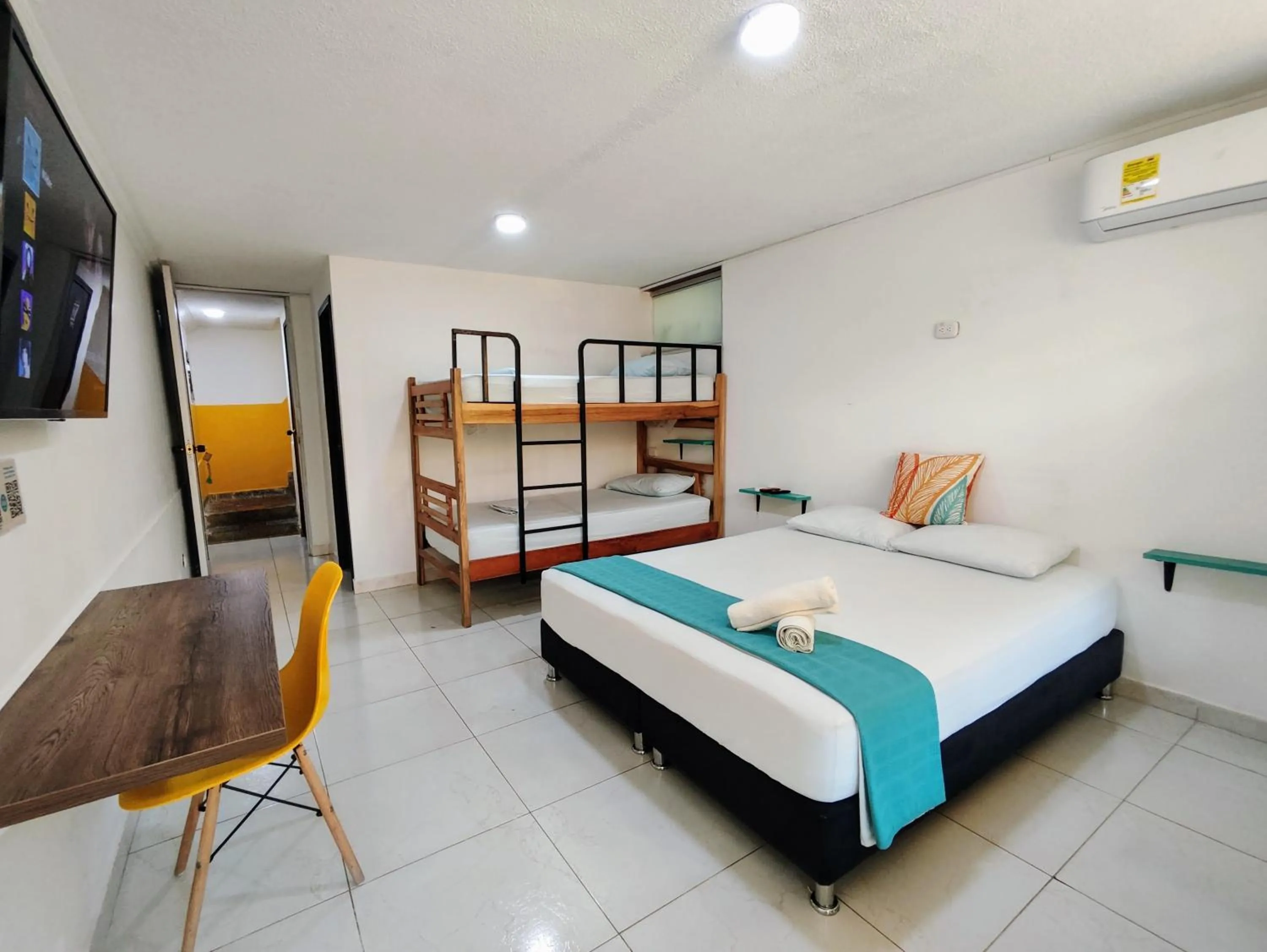 Bed in Bona Vida Hotel