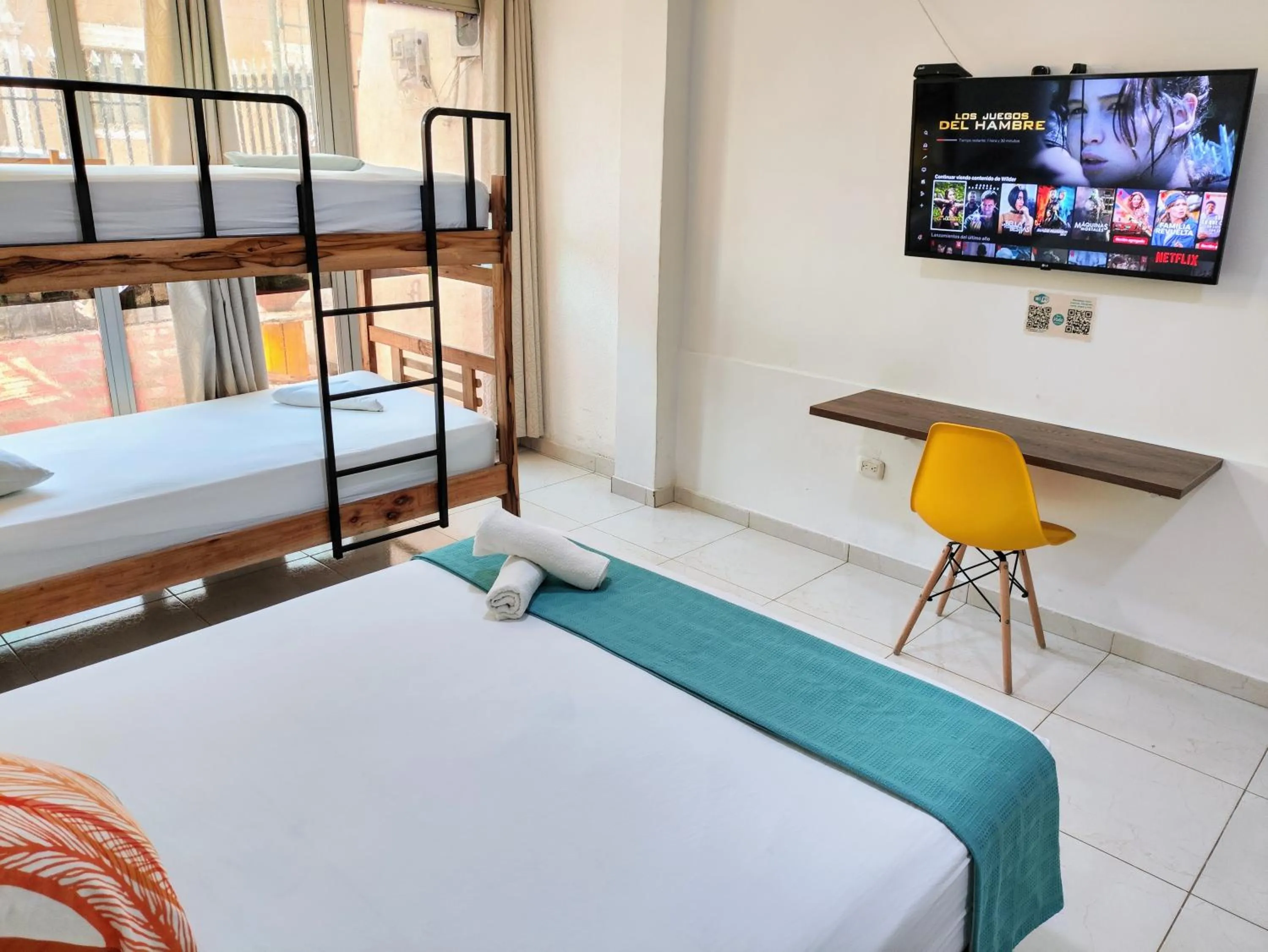 Bed in Bona Vida Hotel