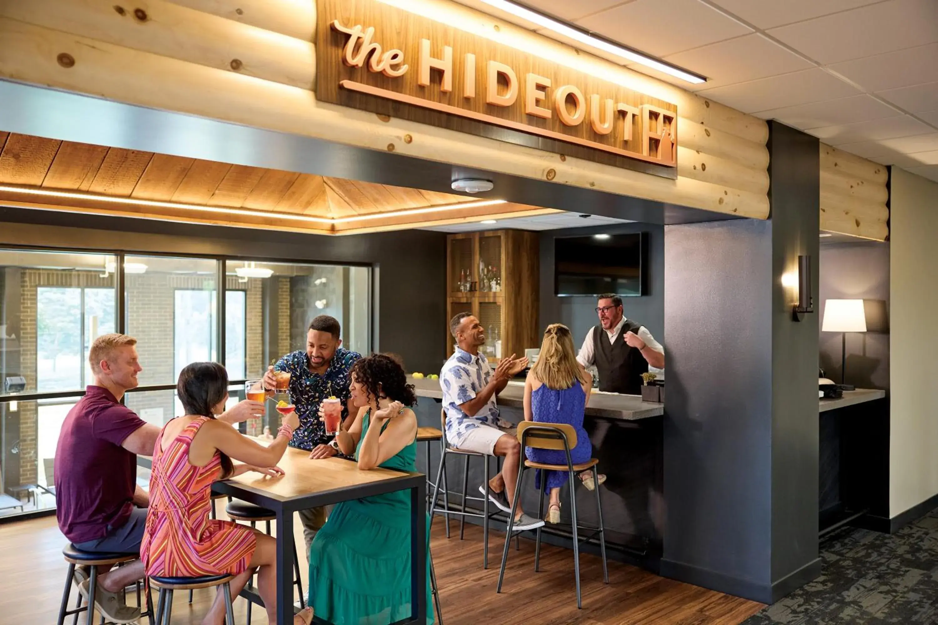 Lounge or bar in Sawmill Creek by Cedar Point Resorts Lounge or bar in Sawmill Creek by Cedar Point Resorts