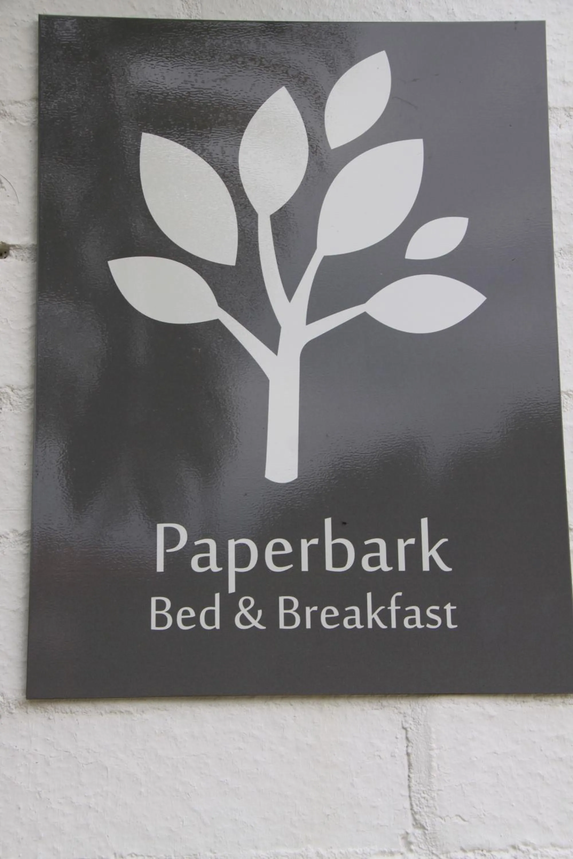 Property logo or sign in Paperbark Bed & Breakfast