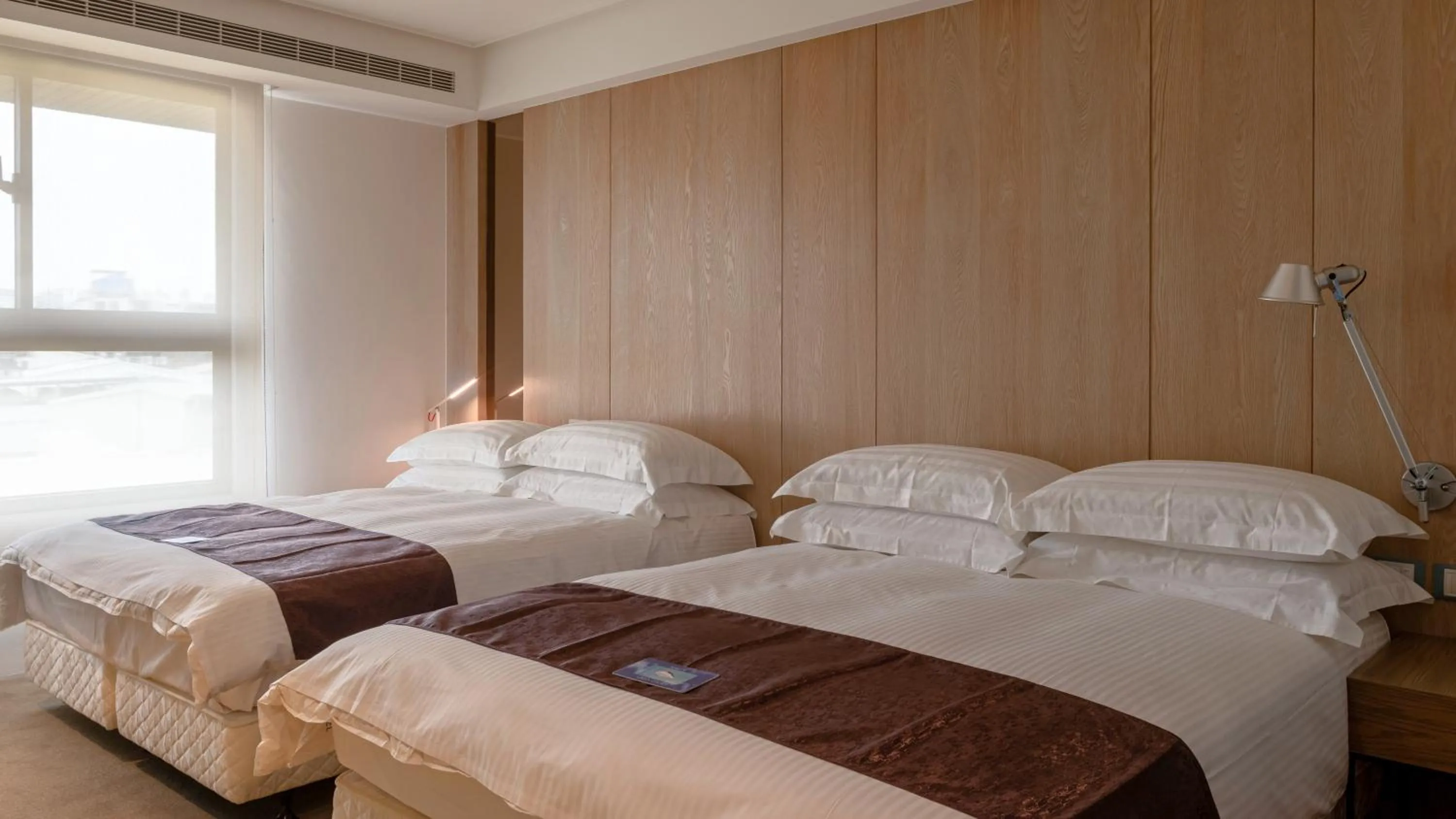 Bed in GOGO Hotel 市政館