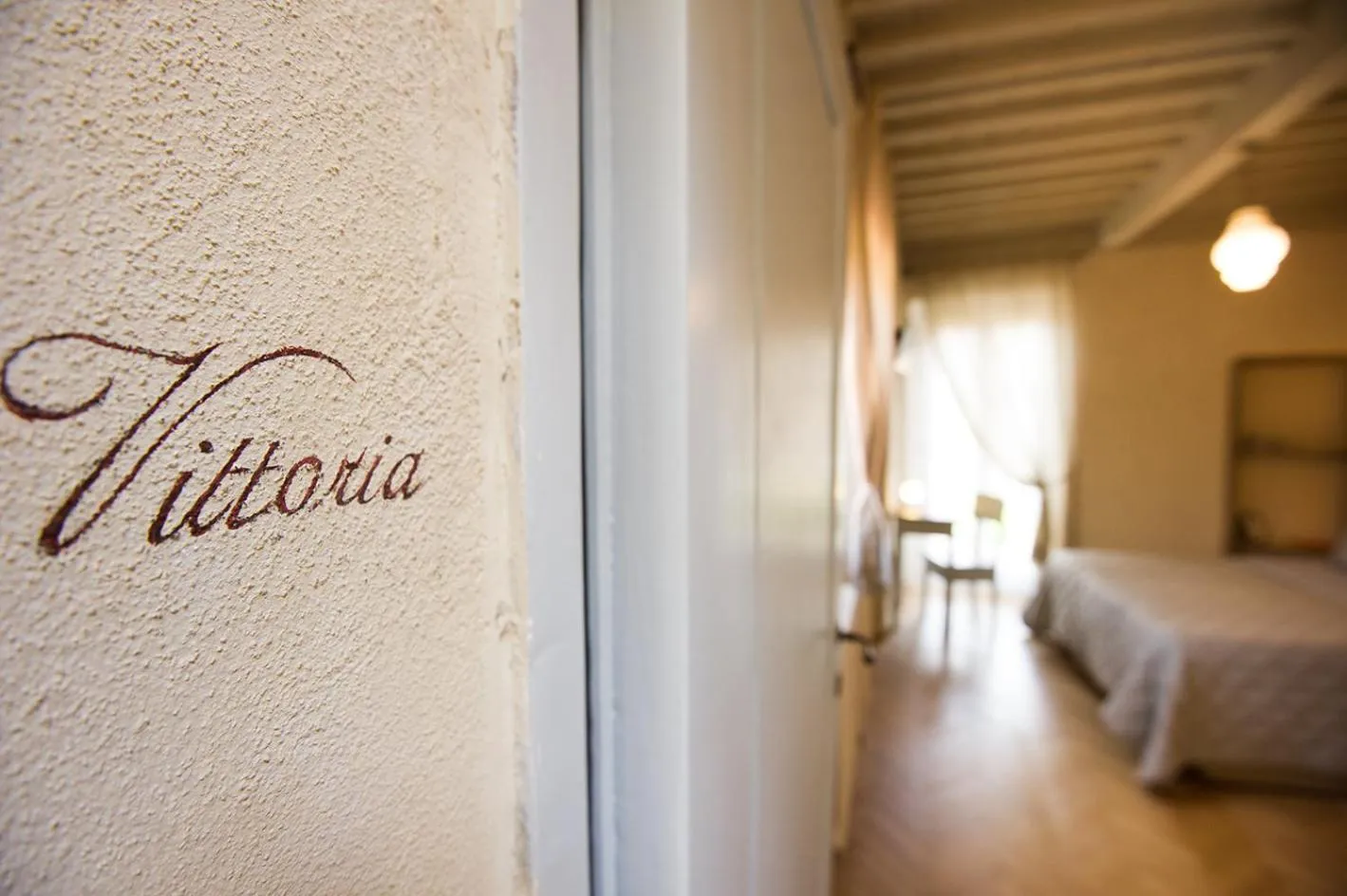 Decorative detail, Bed in Il Piccolo Cavour Charming House B&B