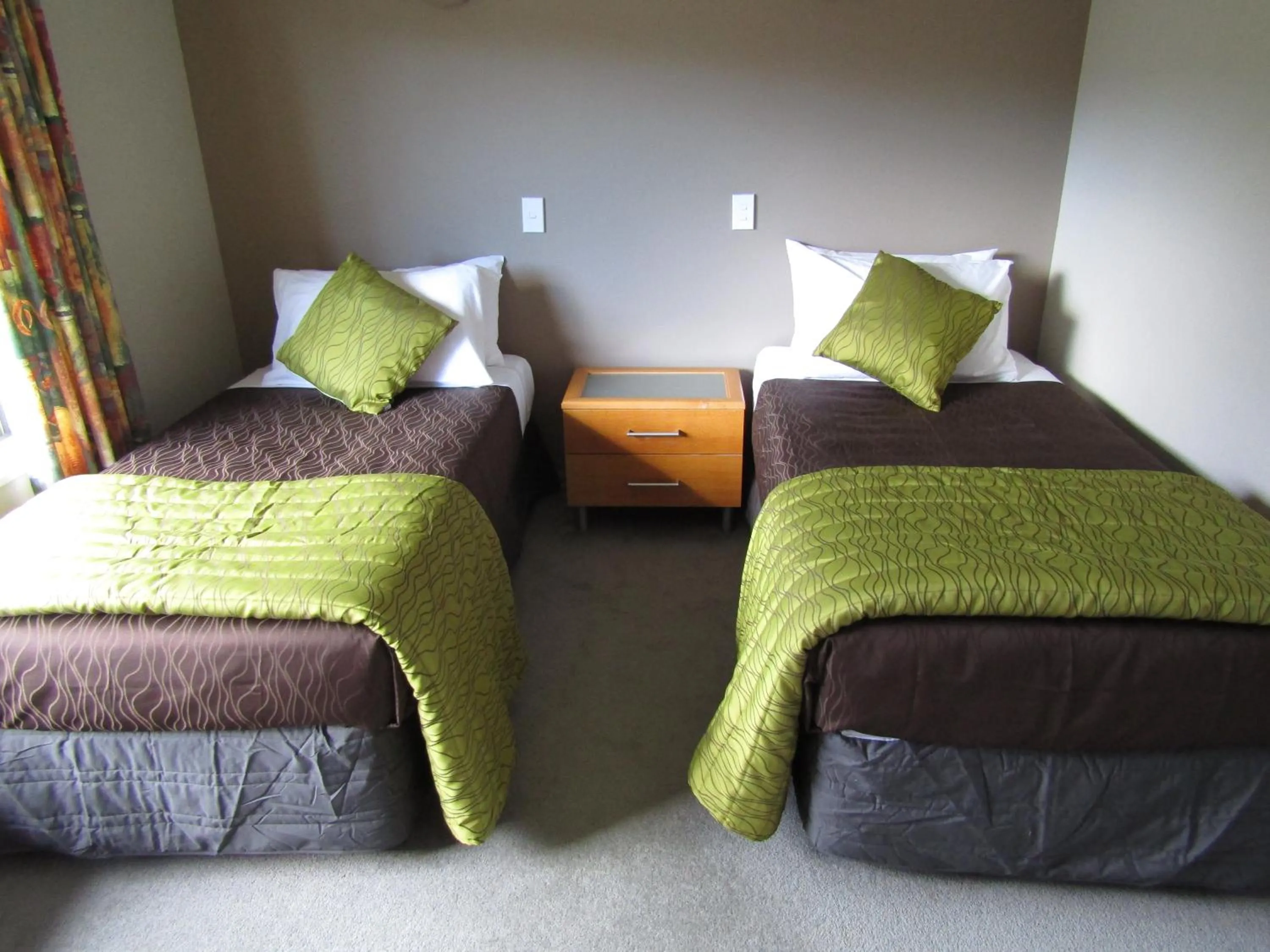 Bed in Hotel Lake Brunner