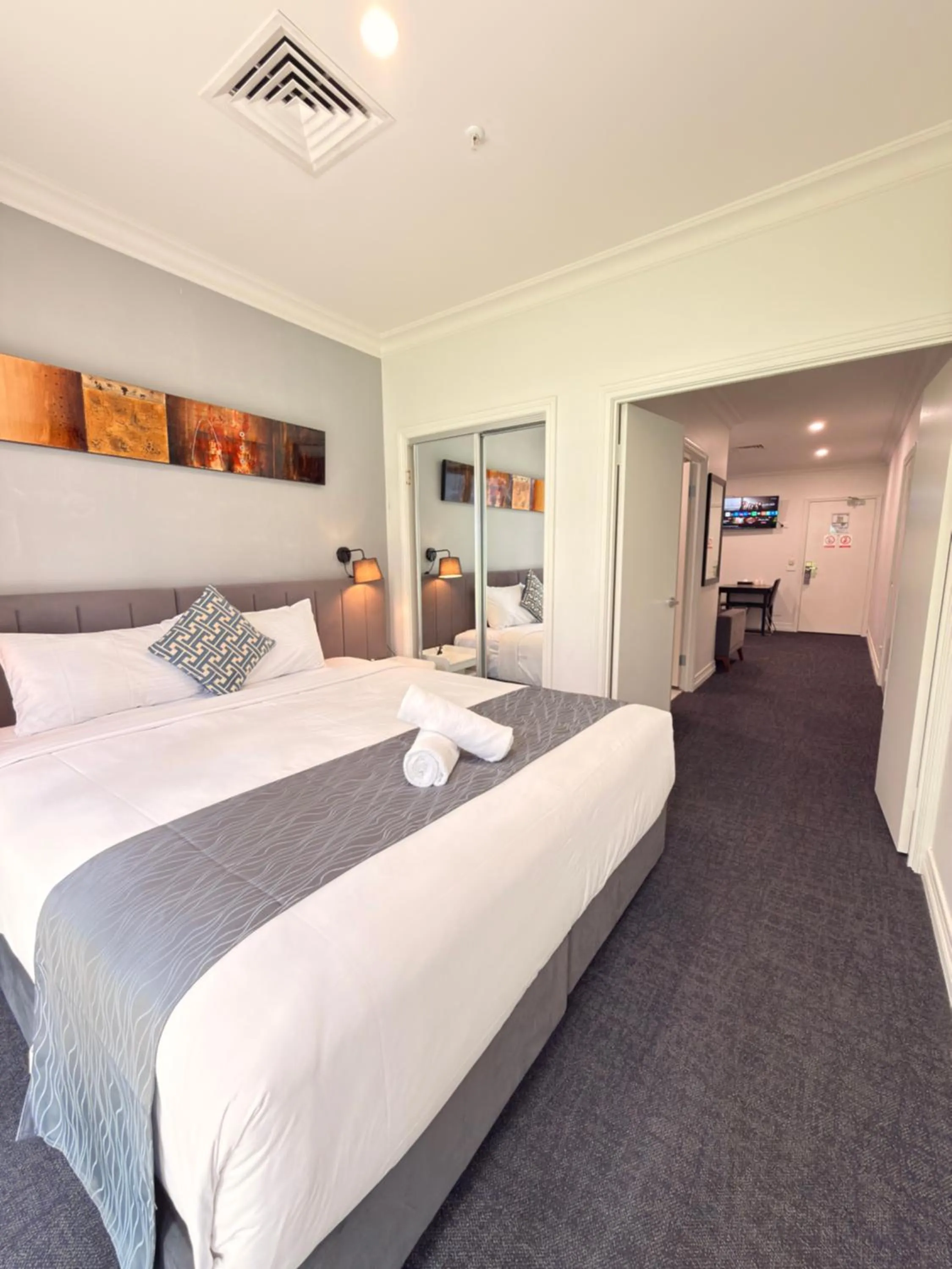 Bed in Comfort Apartments Melbourne Central