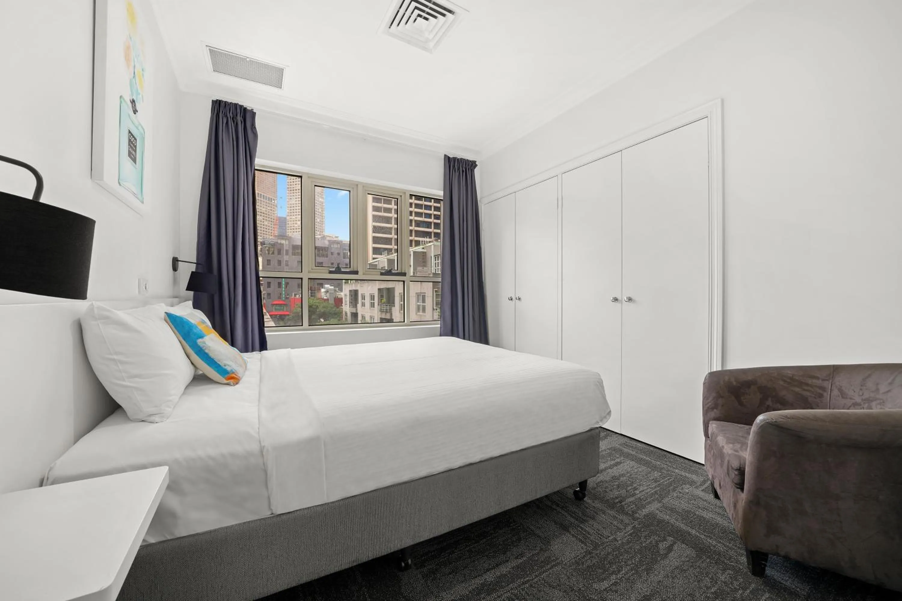 Bed in Comfort Apartments Melbourne Central