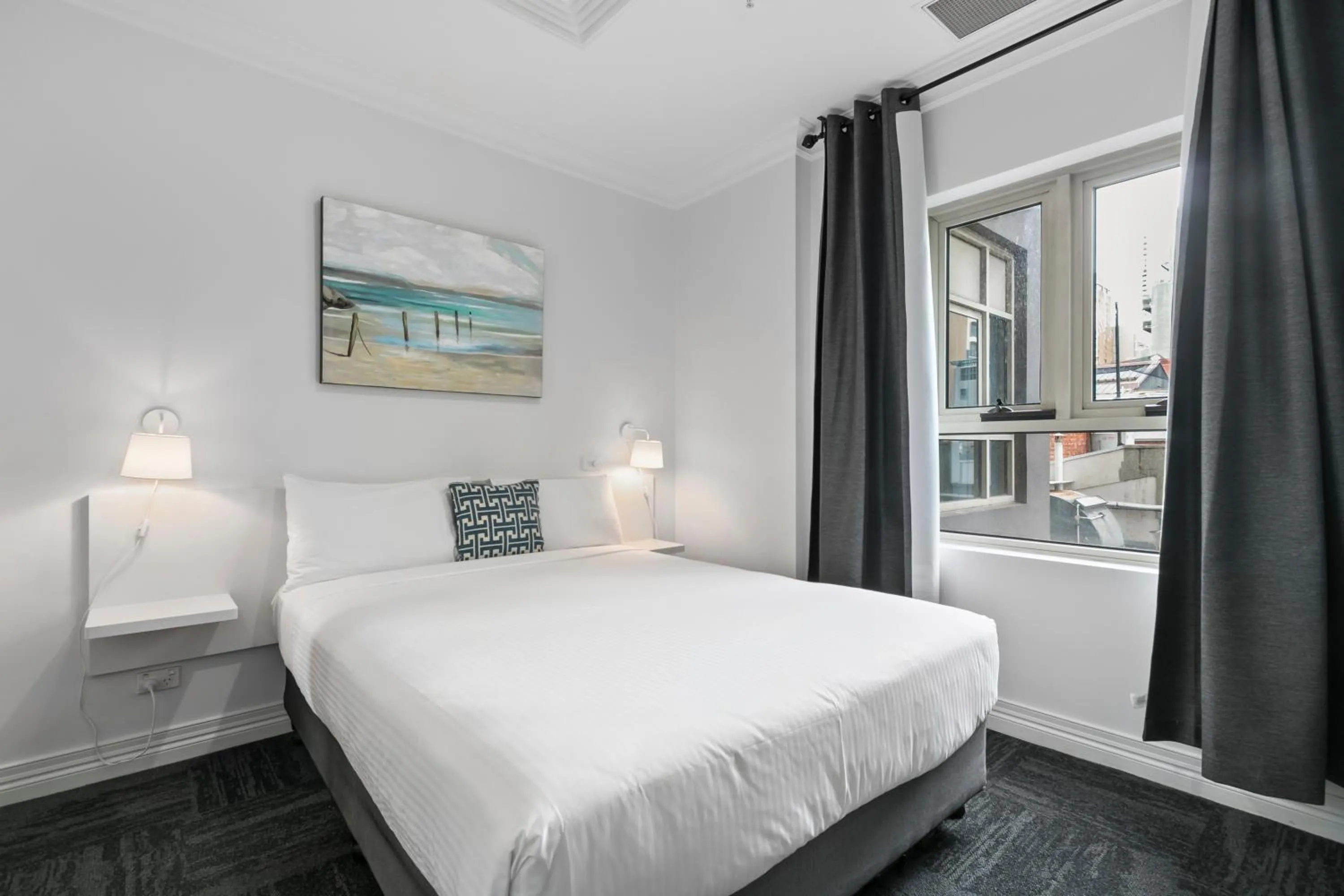 Bed in Comfort Apartments Melbourne Central