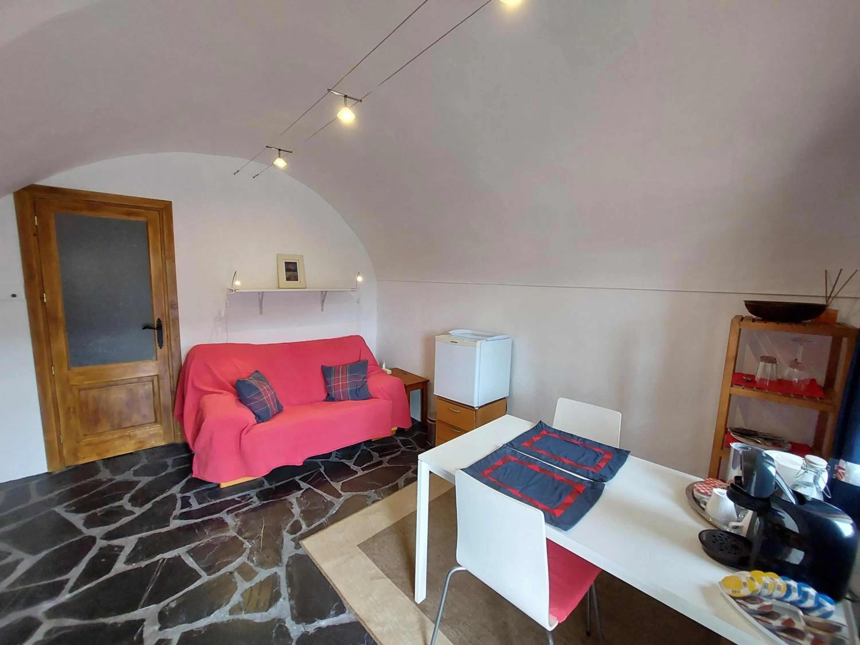 Seating area, Bed in Cala Clareta