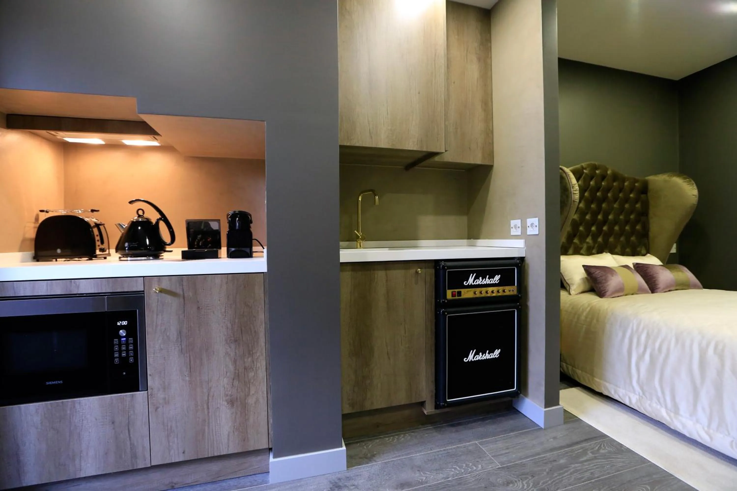 Kitchen or kitchenette, Bed in Charm Flats