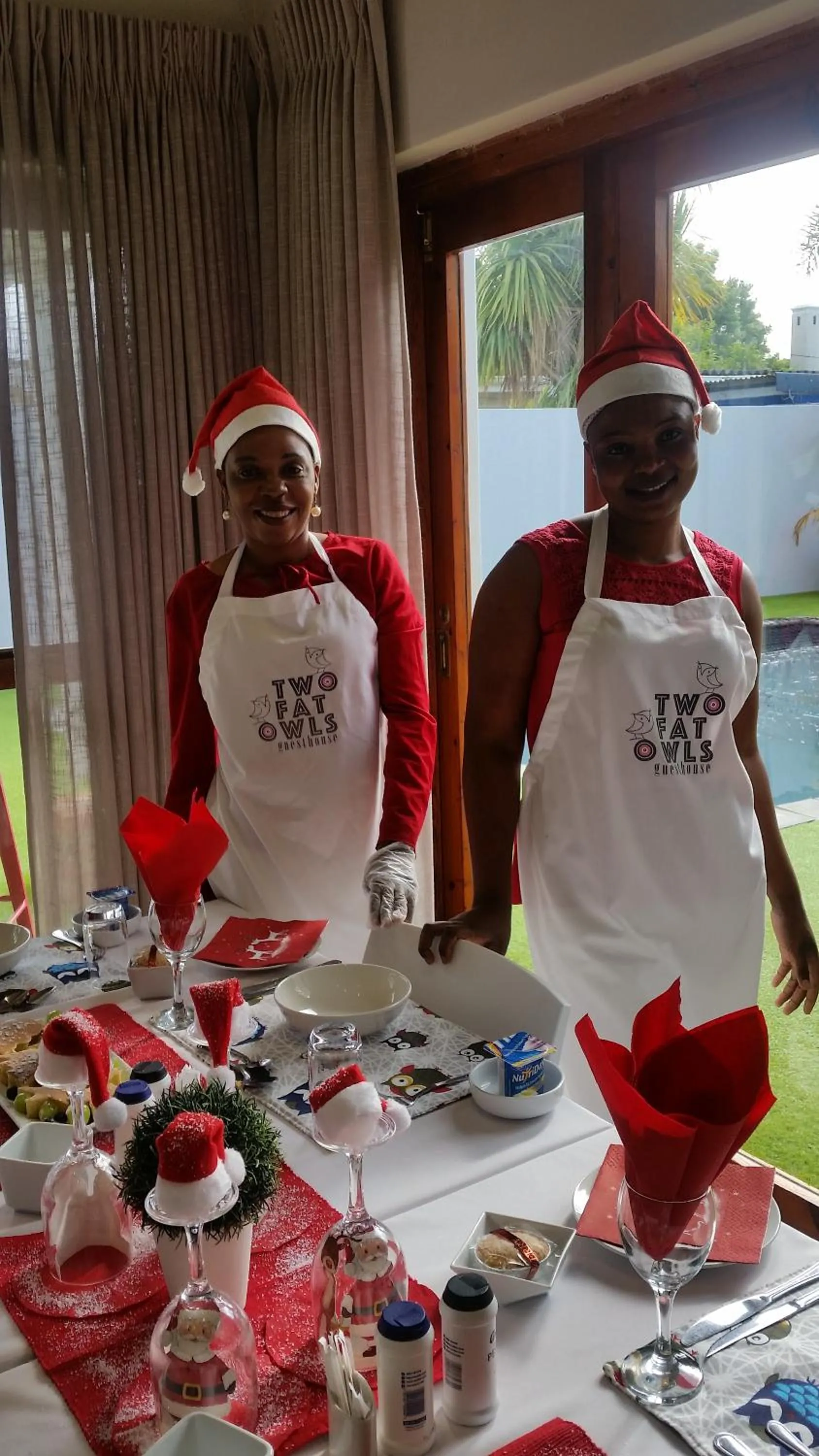 Staff in Two Fat Owls Guesthouse