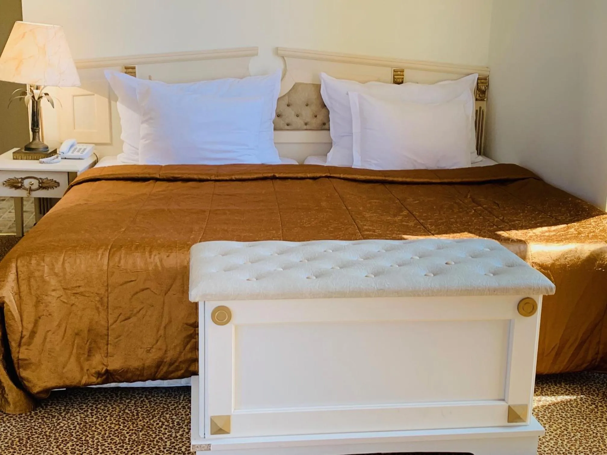 Bed in Imperial Palace Hotel