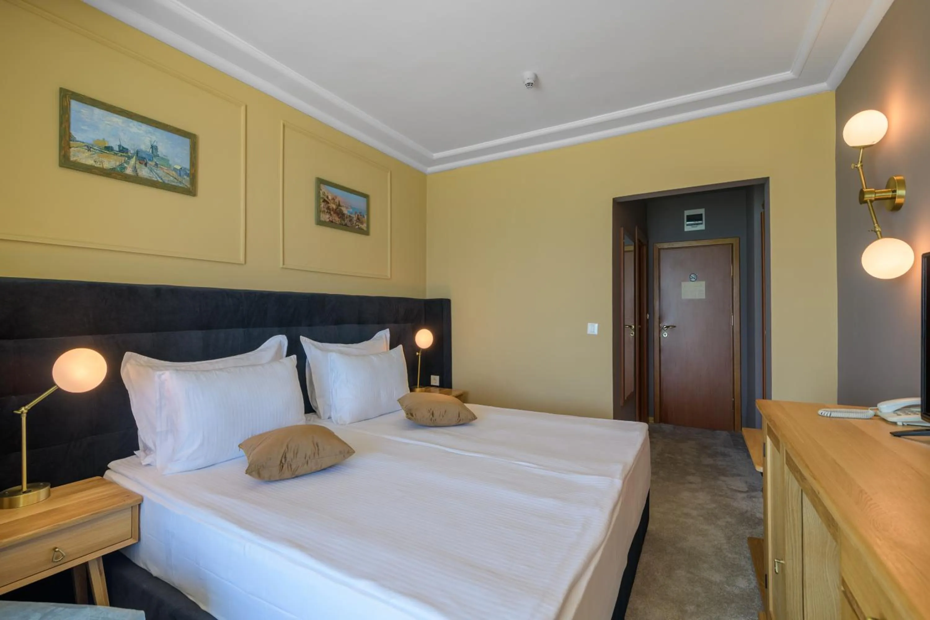 Bed in Marina Hotel, Sunny Day