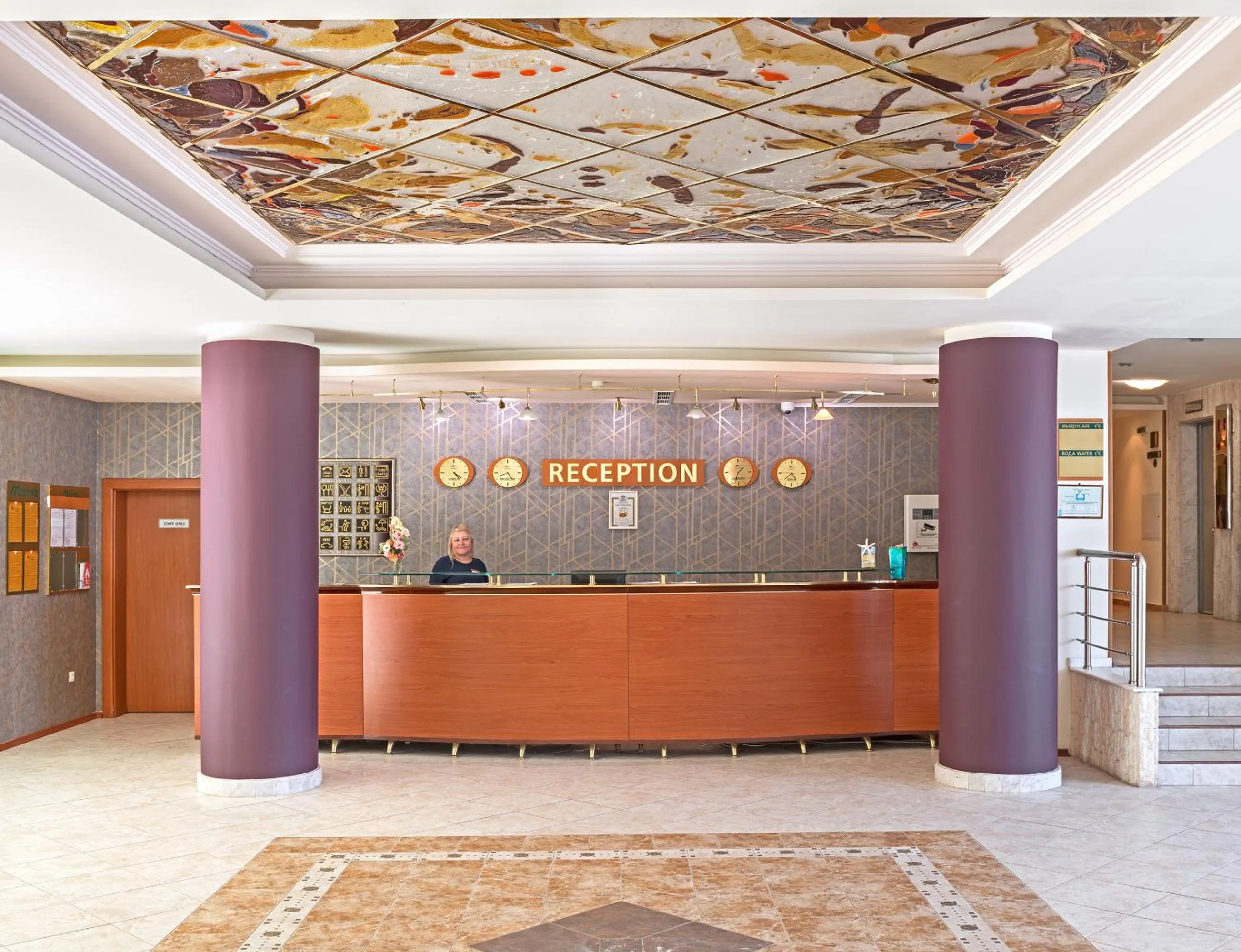 Staff in Marina Hotel, Sunny Day