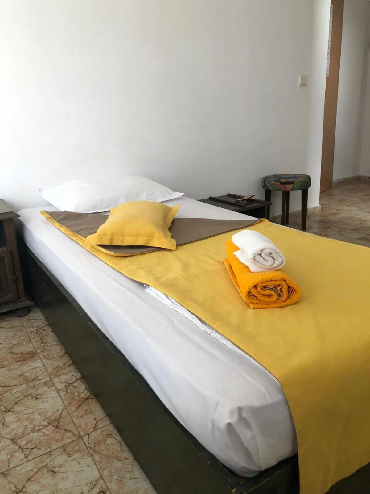 Bed in Sunny Varshava Hotel