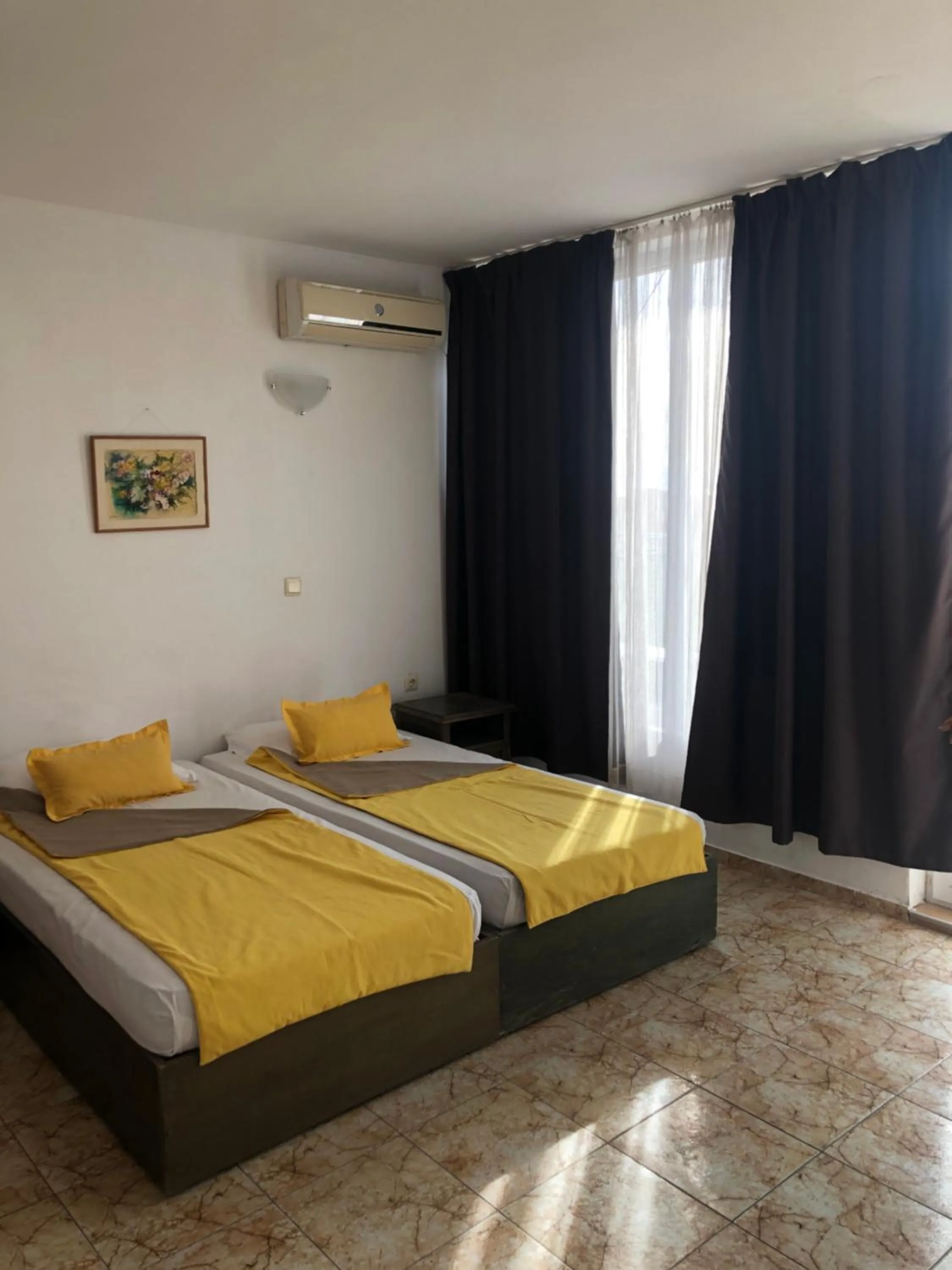 Bed in Sunny Varshava Hotel