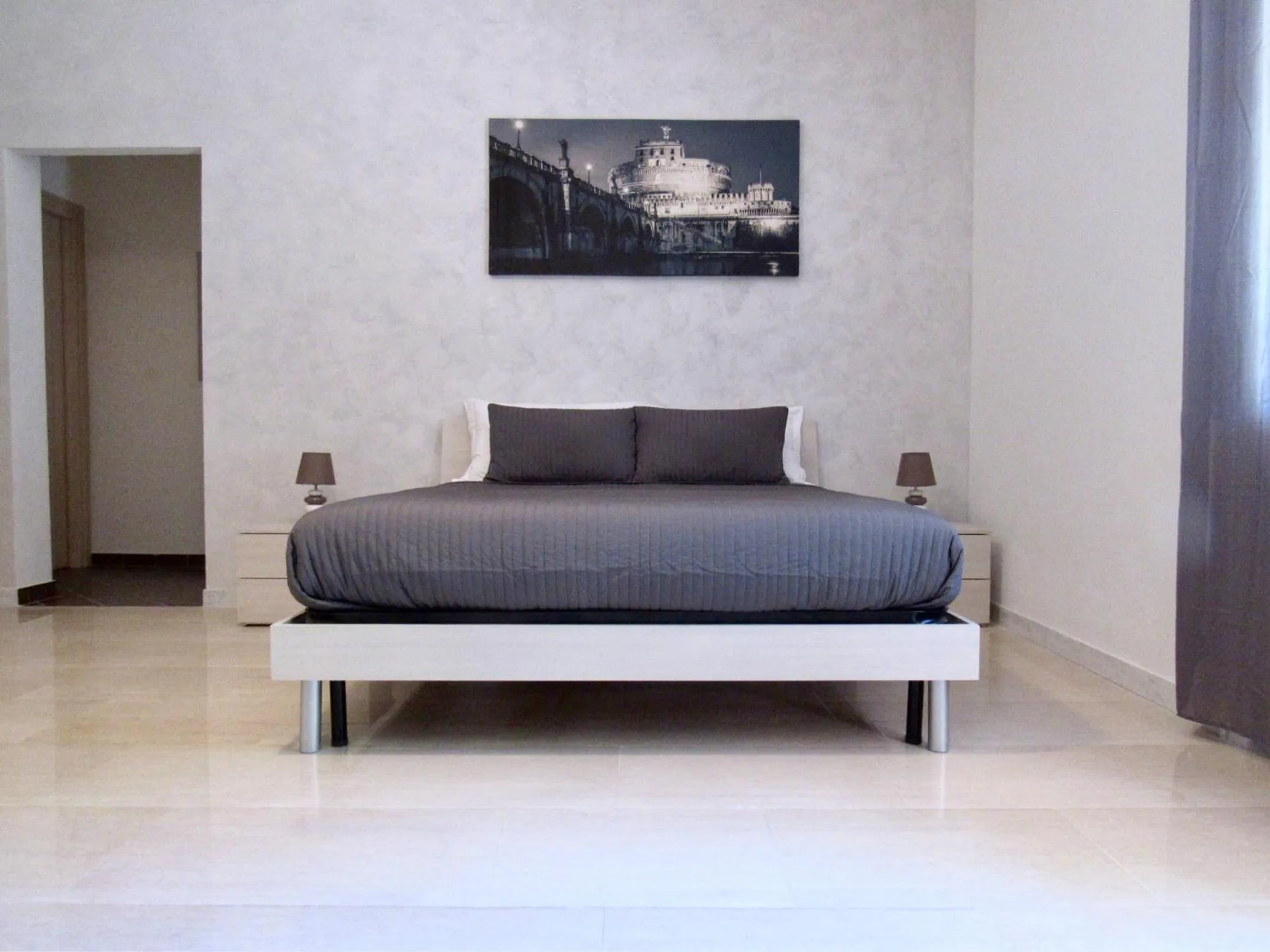 Bed in Roema Guest House