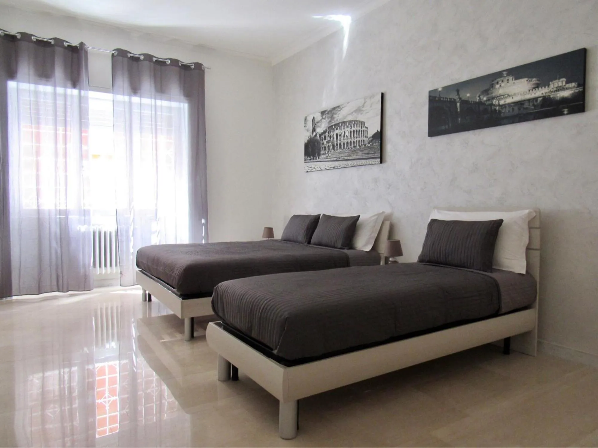 Bed in Roema Guest House