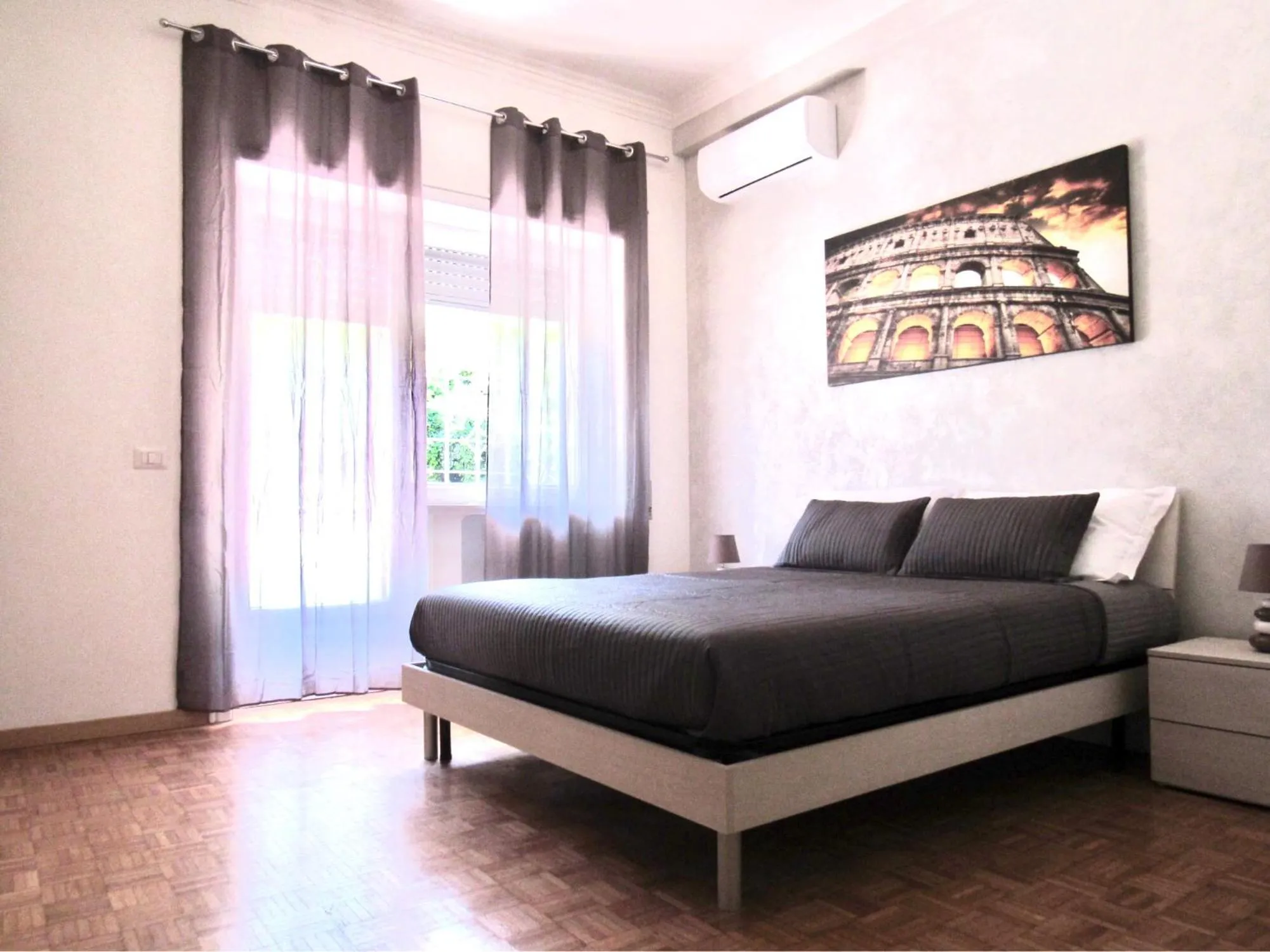 Bed in Roema Guest House