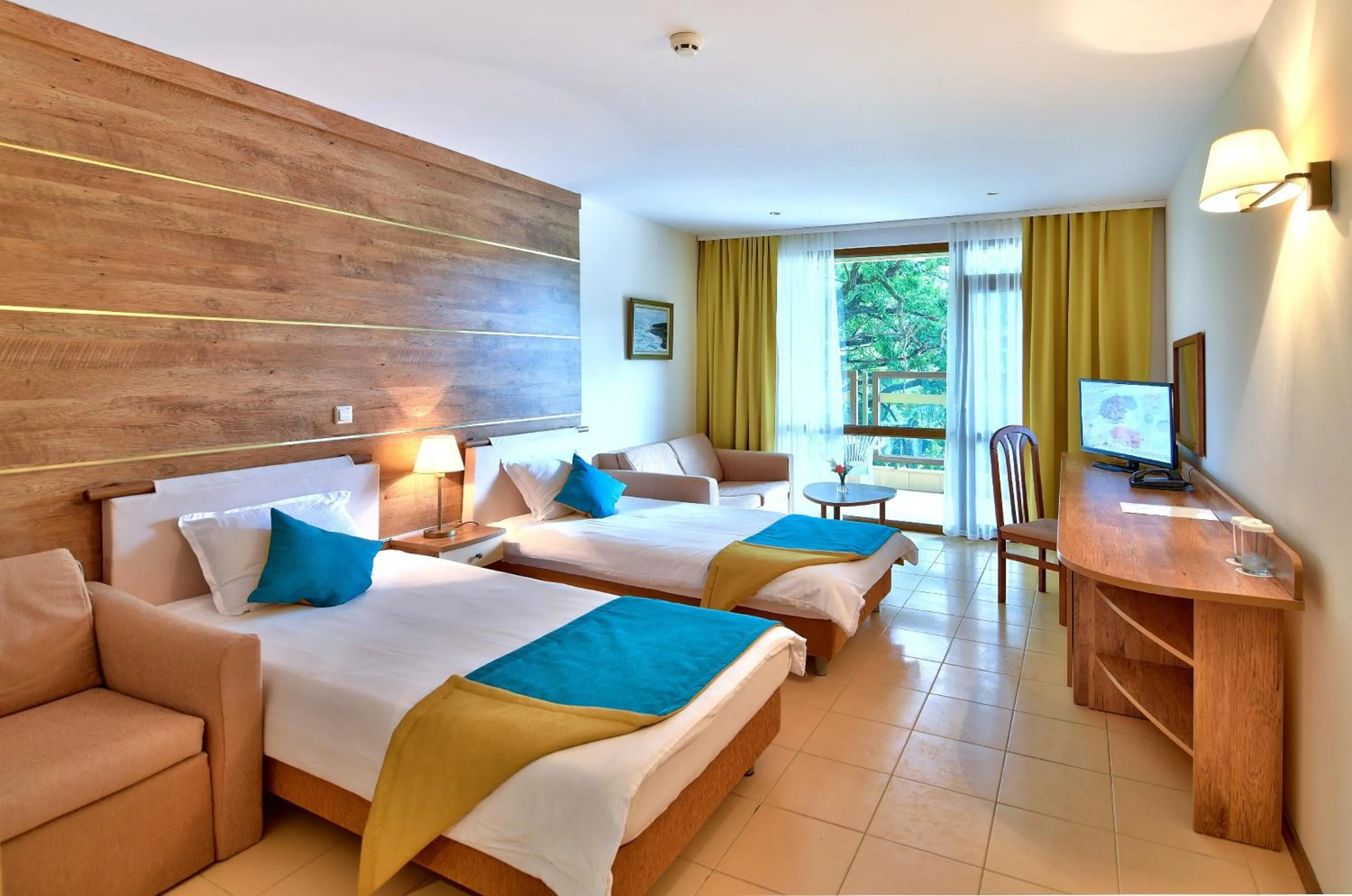 Photo of the whole room in Les Magnolias Hotel