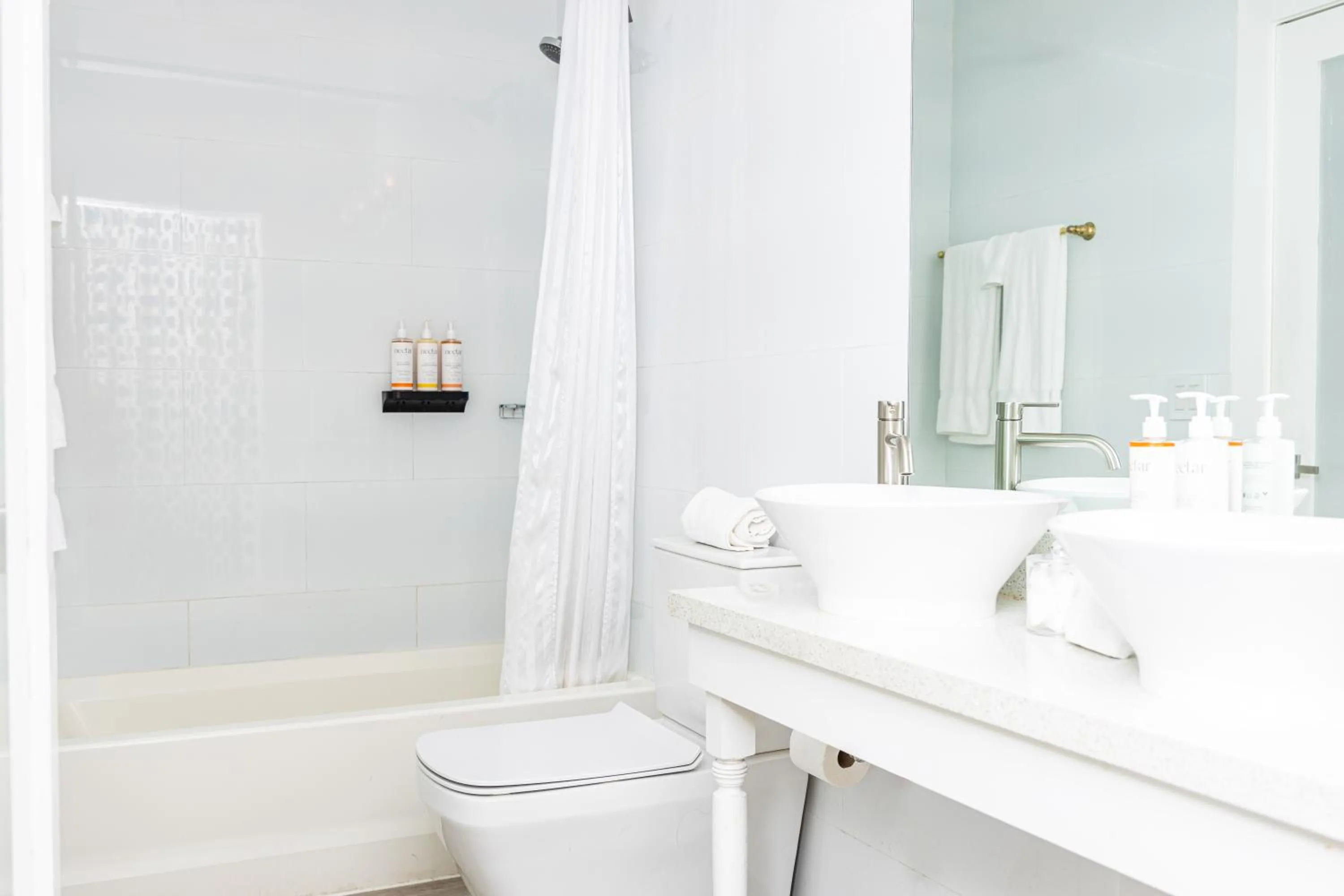 Bathroom in Oceanside Hotel and Suites