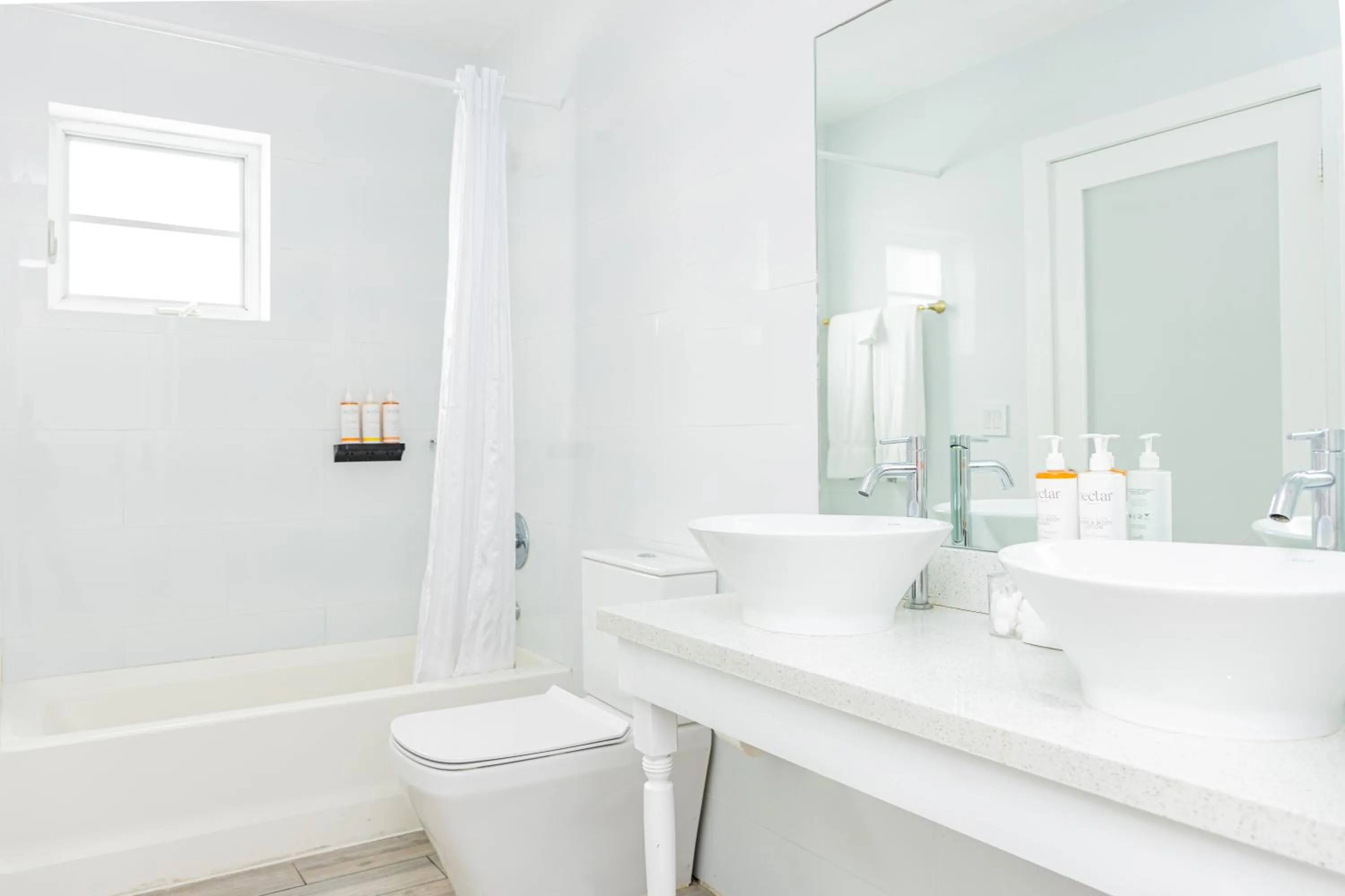Bathroom in Oceanside Hotel and Suites