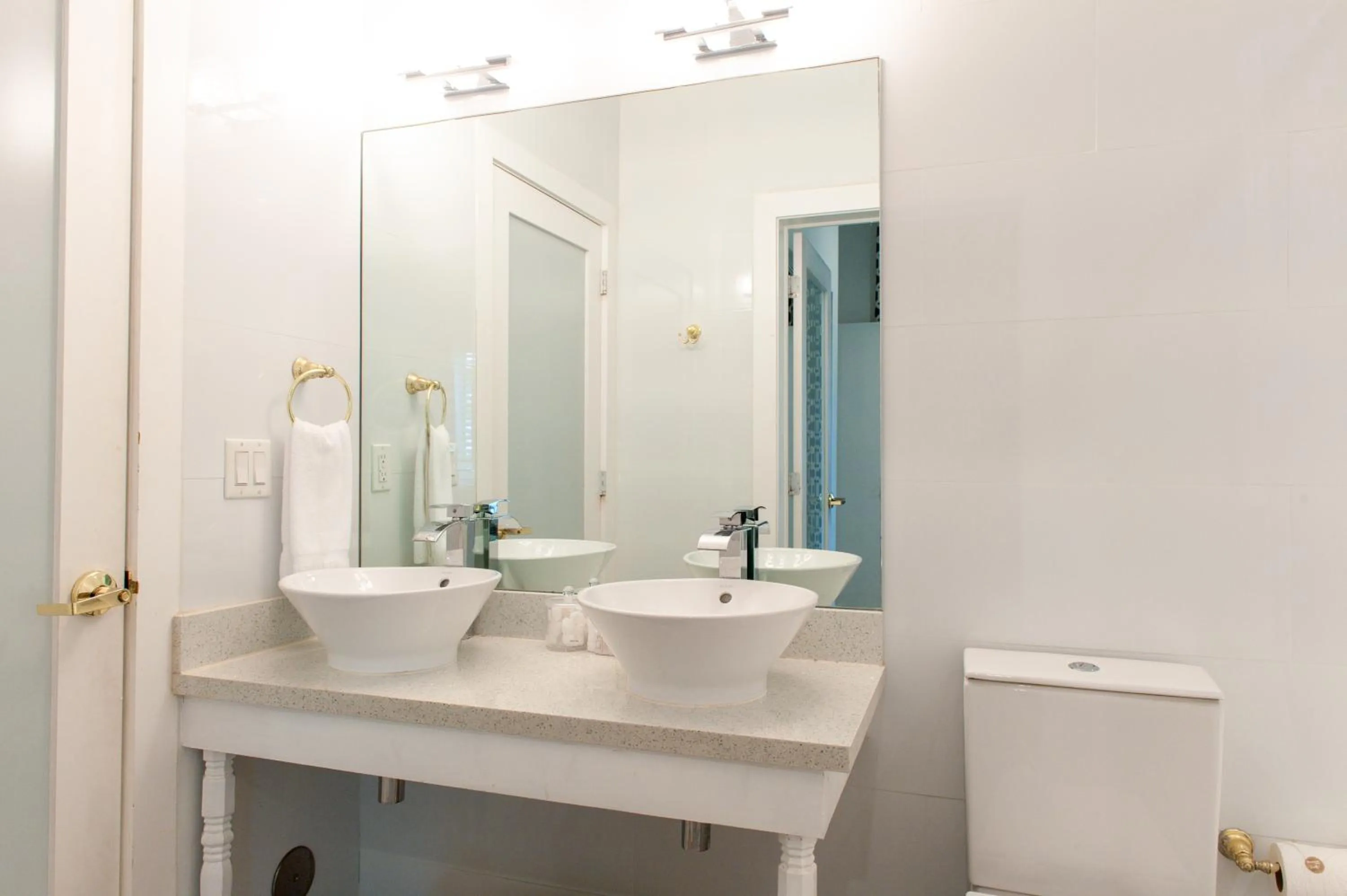 Toilet in Oceanside Hotel and Suites