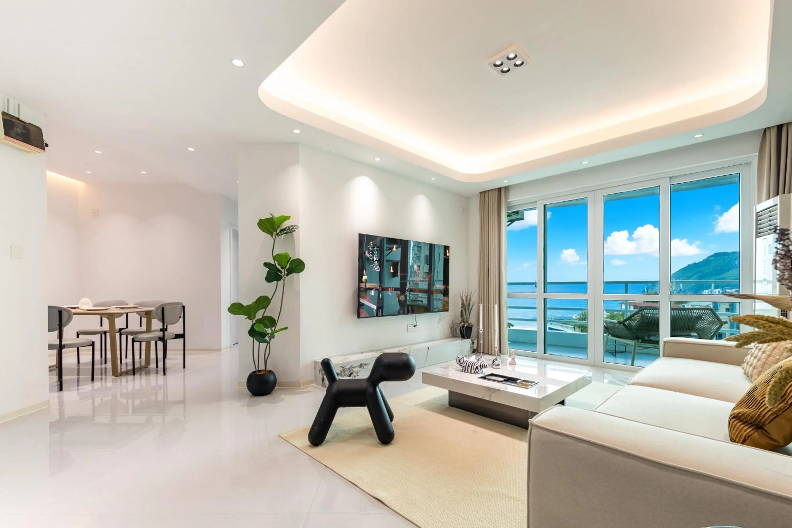 Living room, Bed in Sanya Sun Seaview Apartment