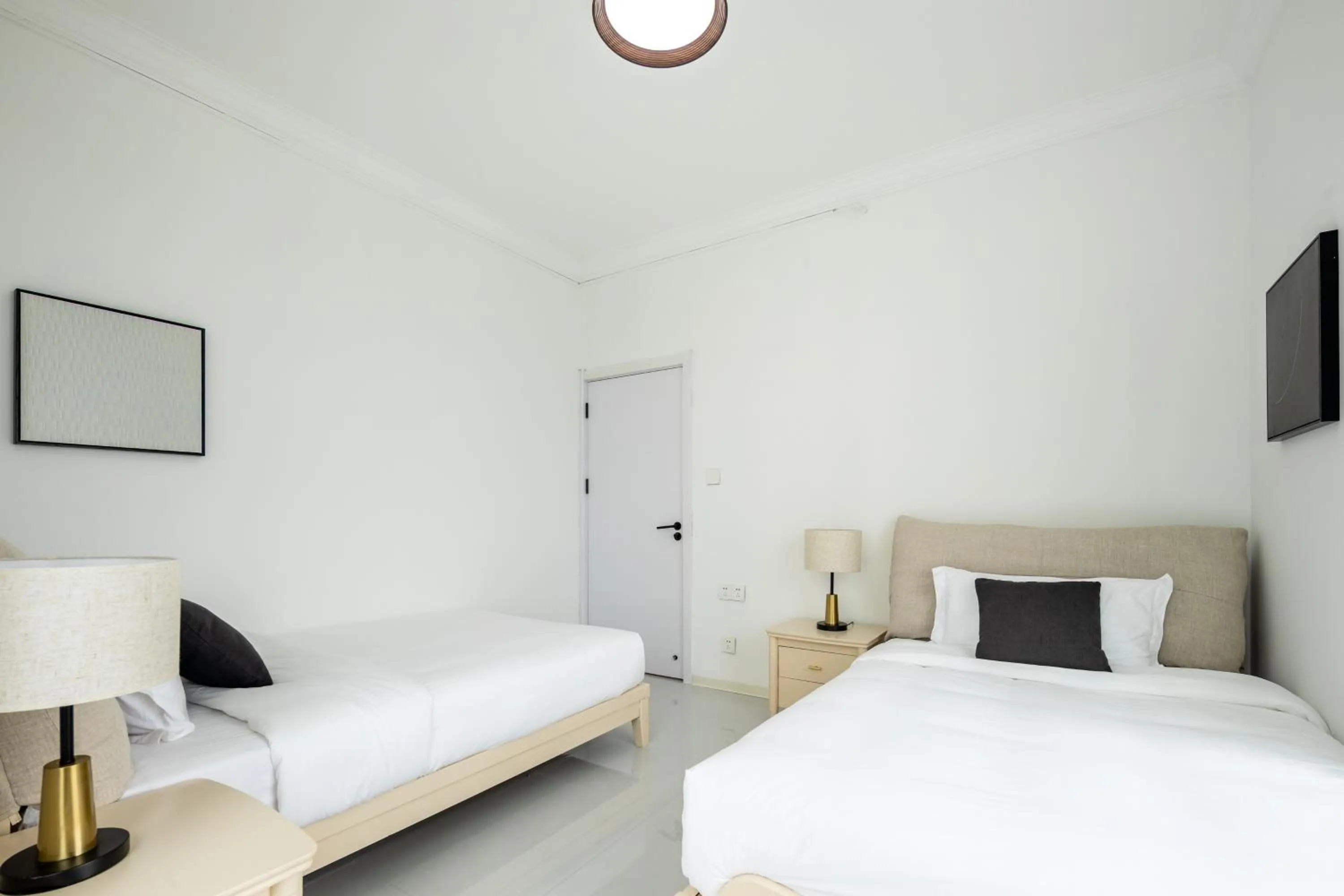 Bed in Sanya Sun Seaview Apartment