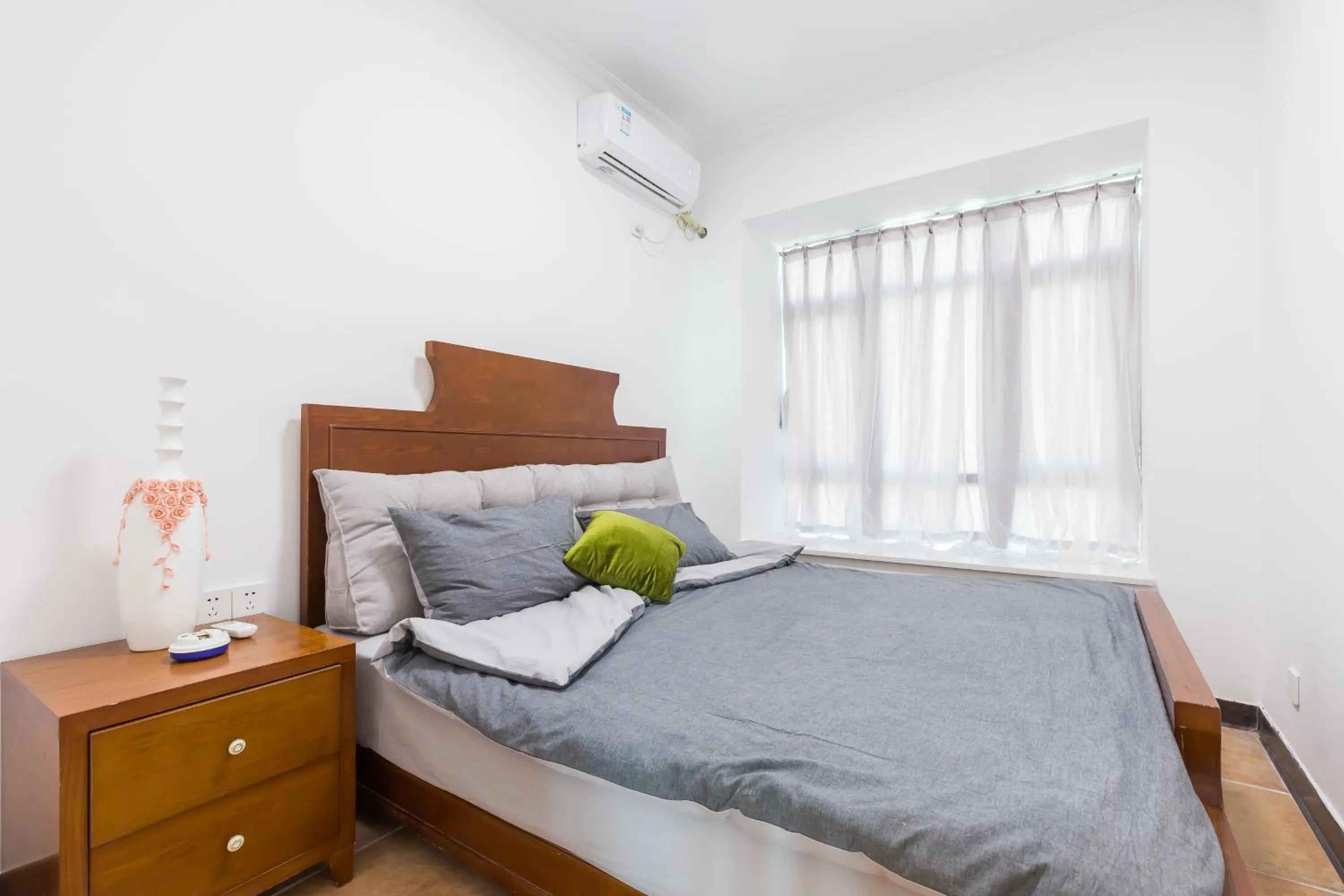Bed in Sanya Sun Seaview Apartment