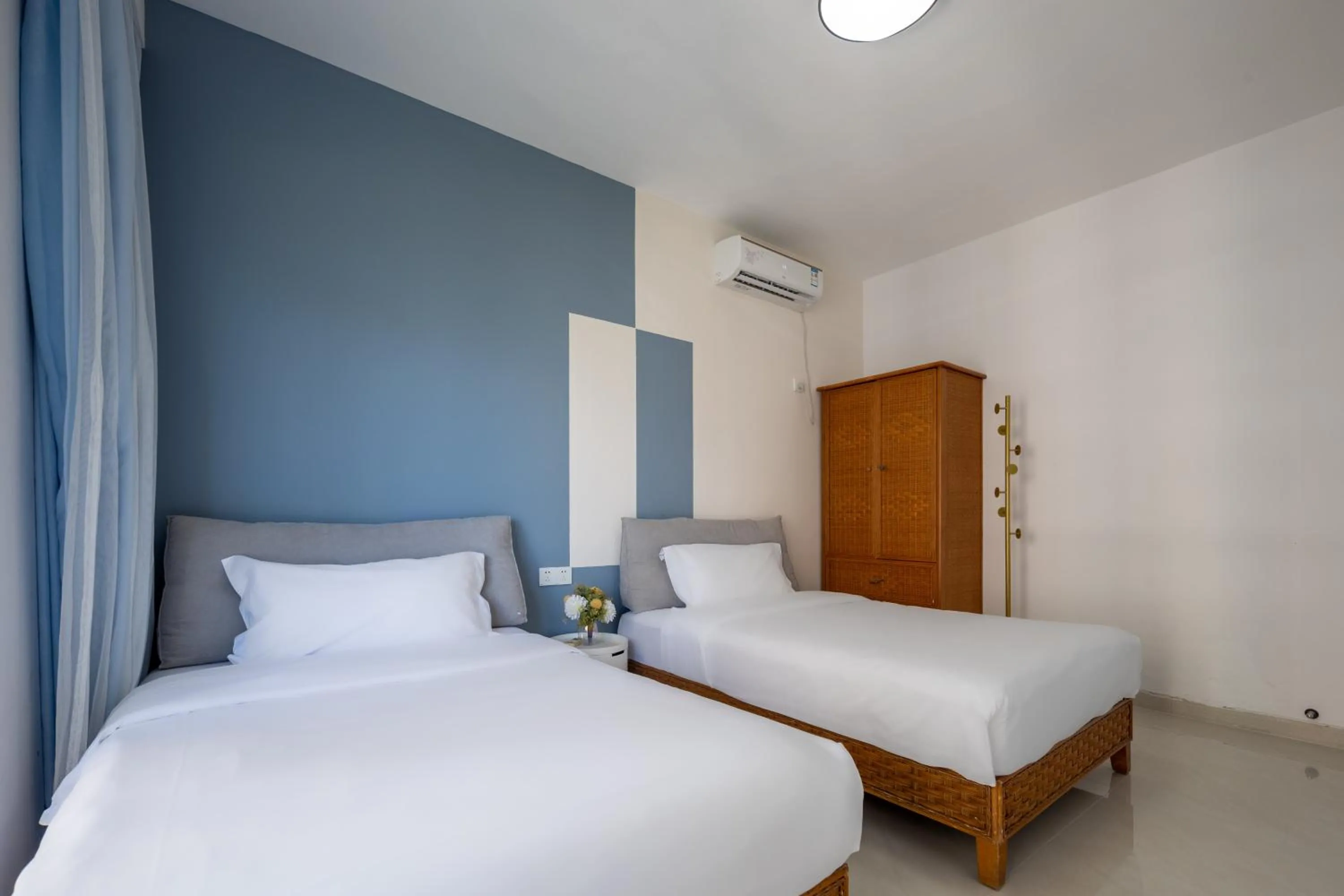Bed in Sanya Sun Seaview Apartment