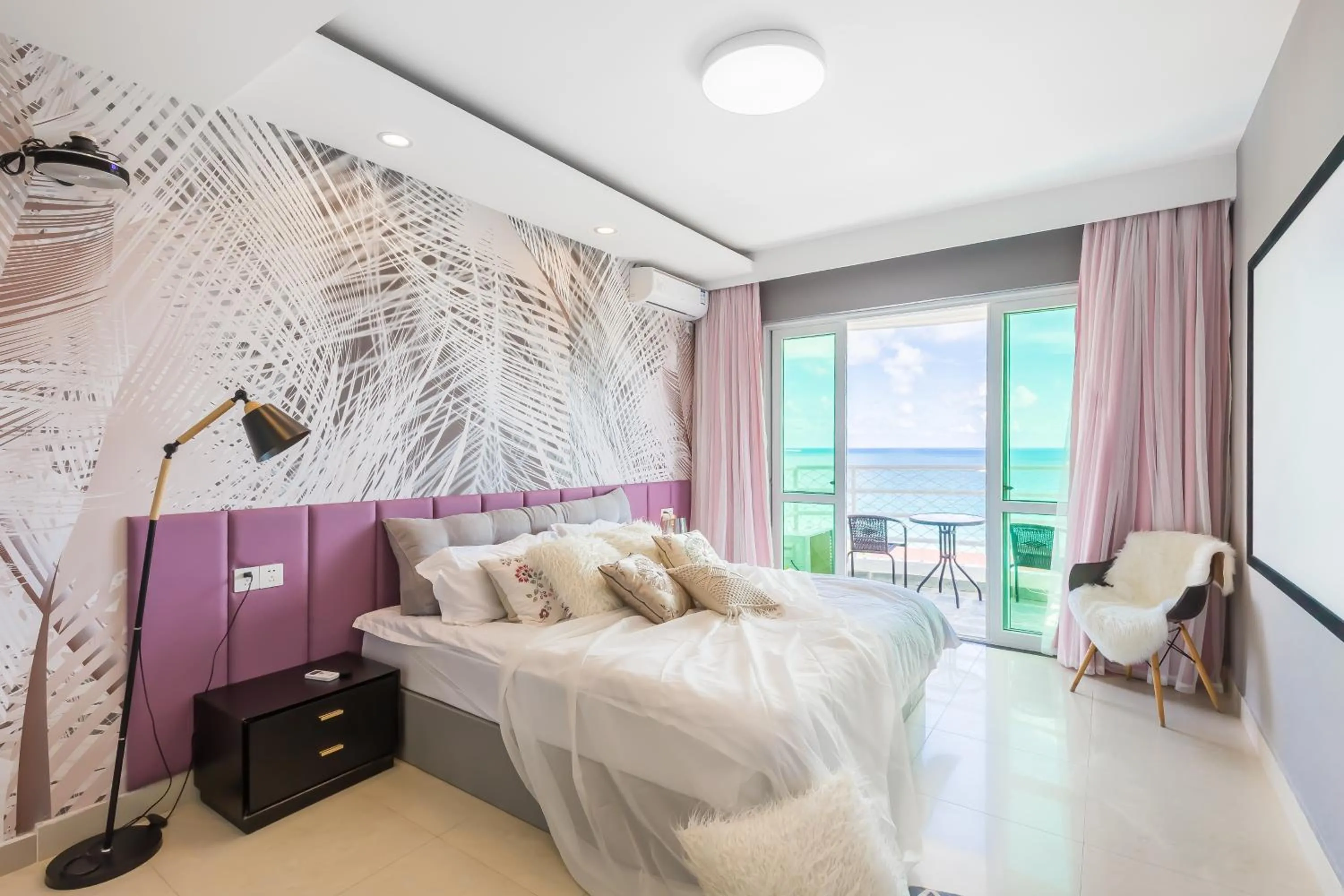 Bed in Sanya Sun Seaview Apartment