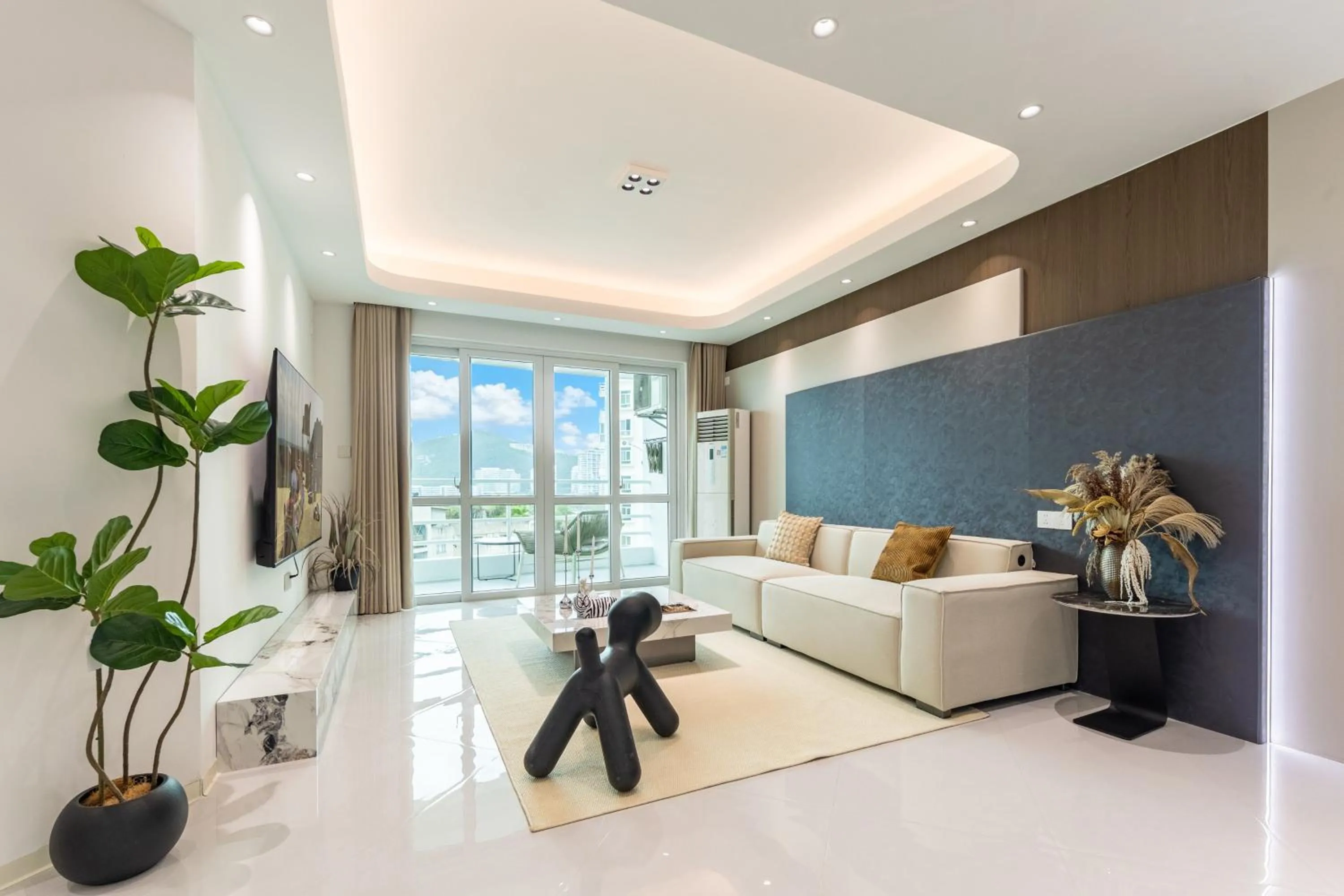 Living room, Bed in Sanya Sun Seaview Apartment