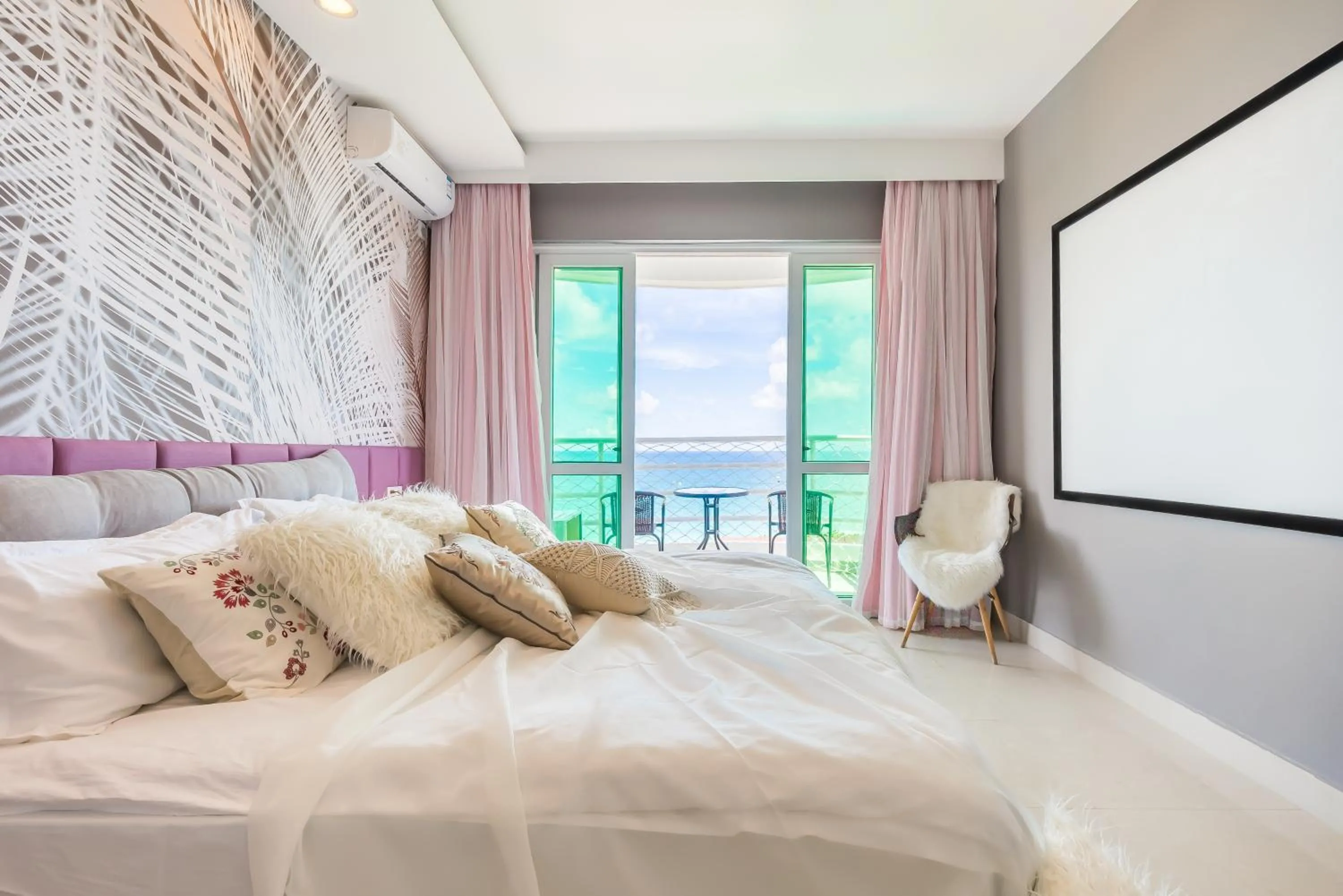 Bed in Sanya Sun Seaview Apartment