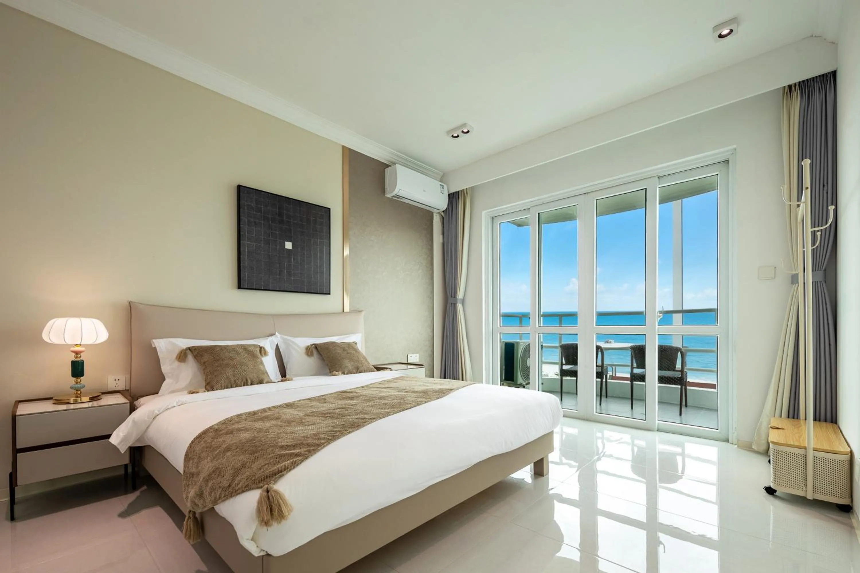 Bed in Sanya Sun Seaview Apartment