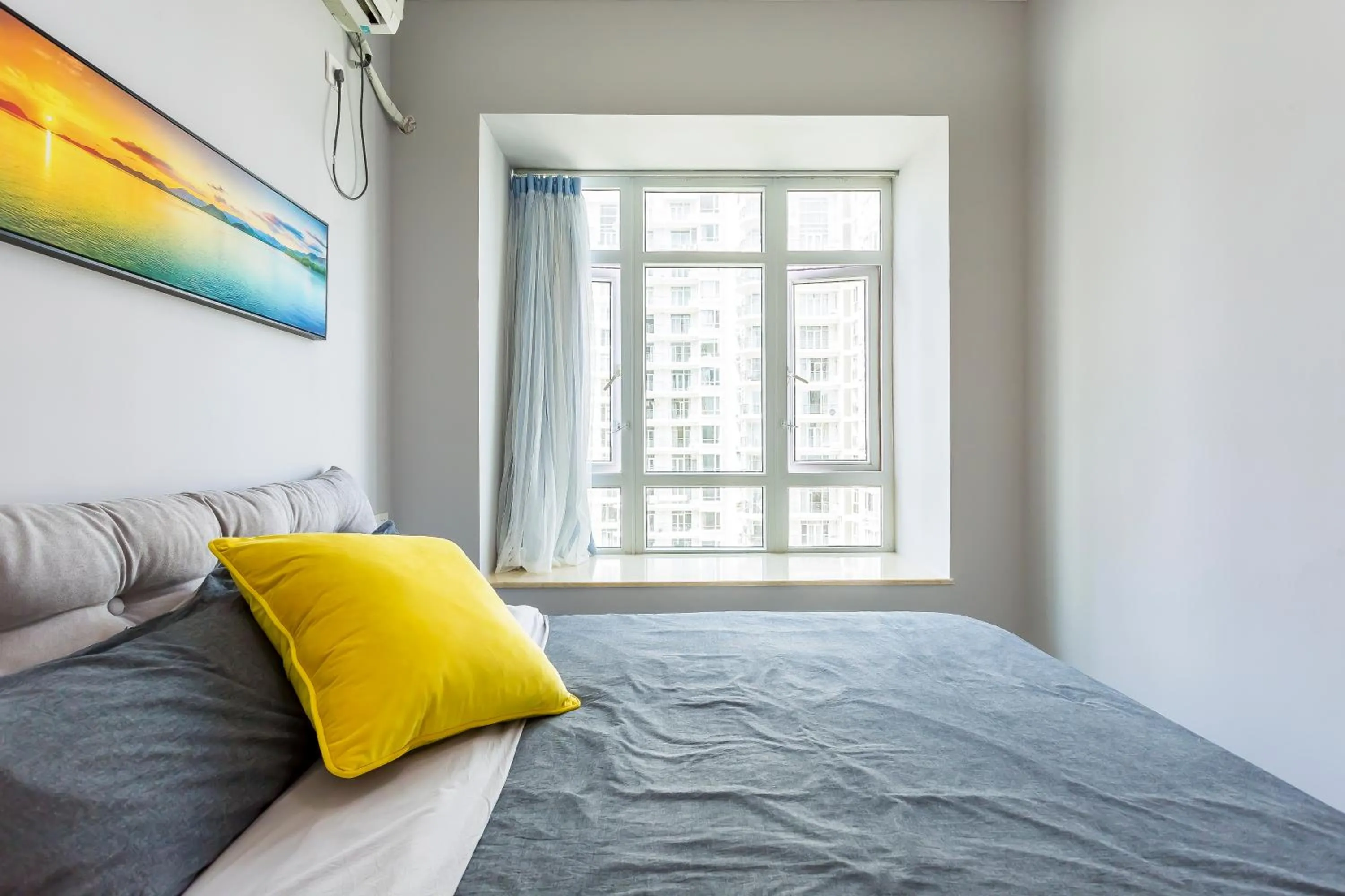 Bed in Sanya Sun Seaview Apartment