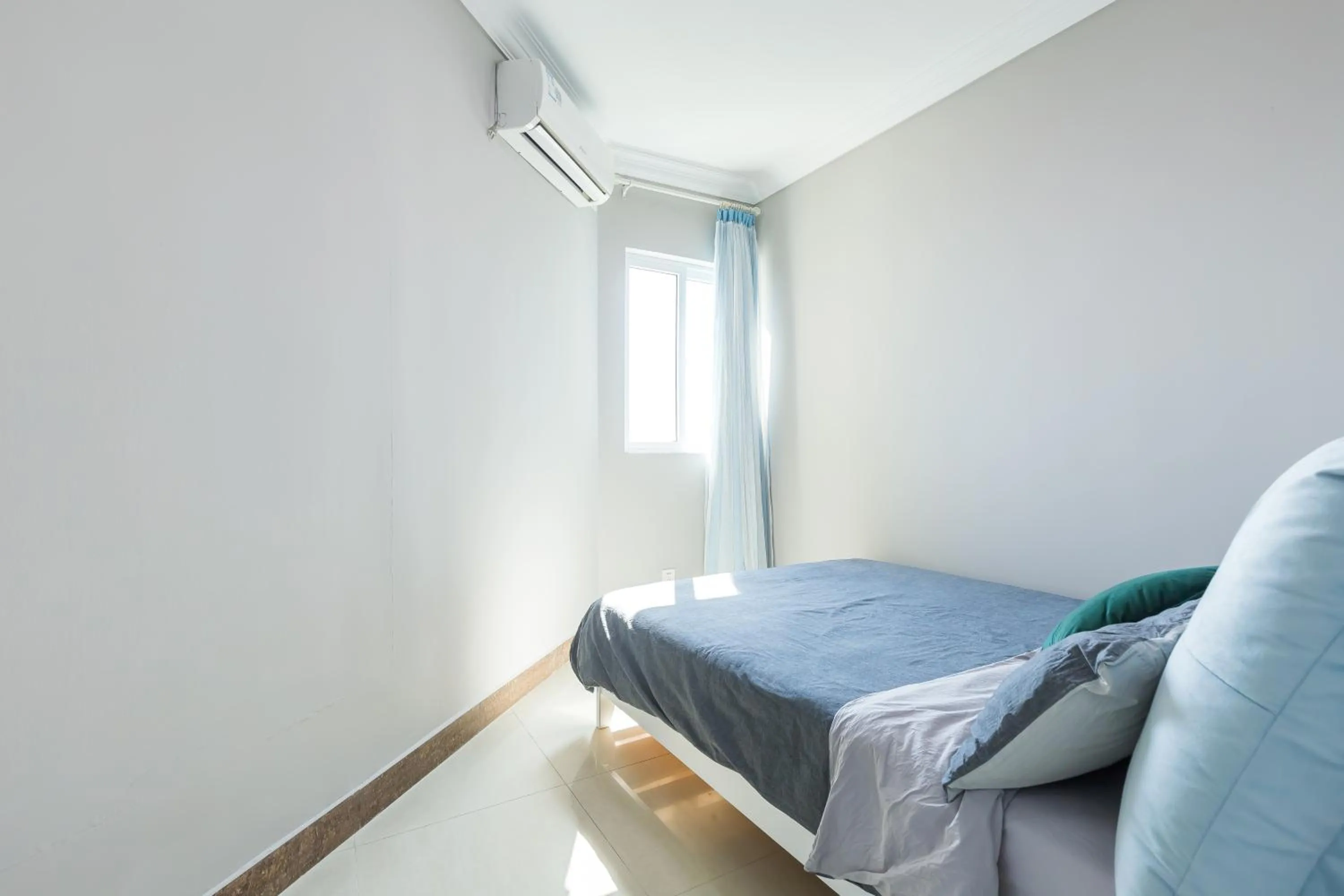 Bed in Sanya Sun Seaview Apartment