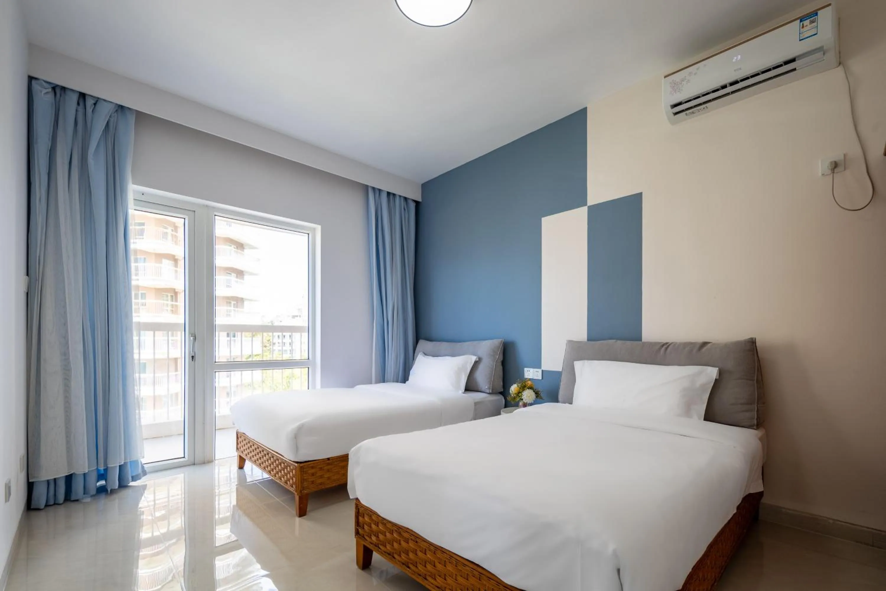 Bed in Sanya Sun Seaview Apartment
