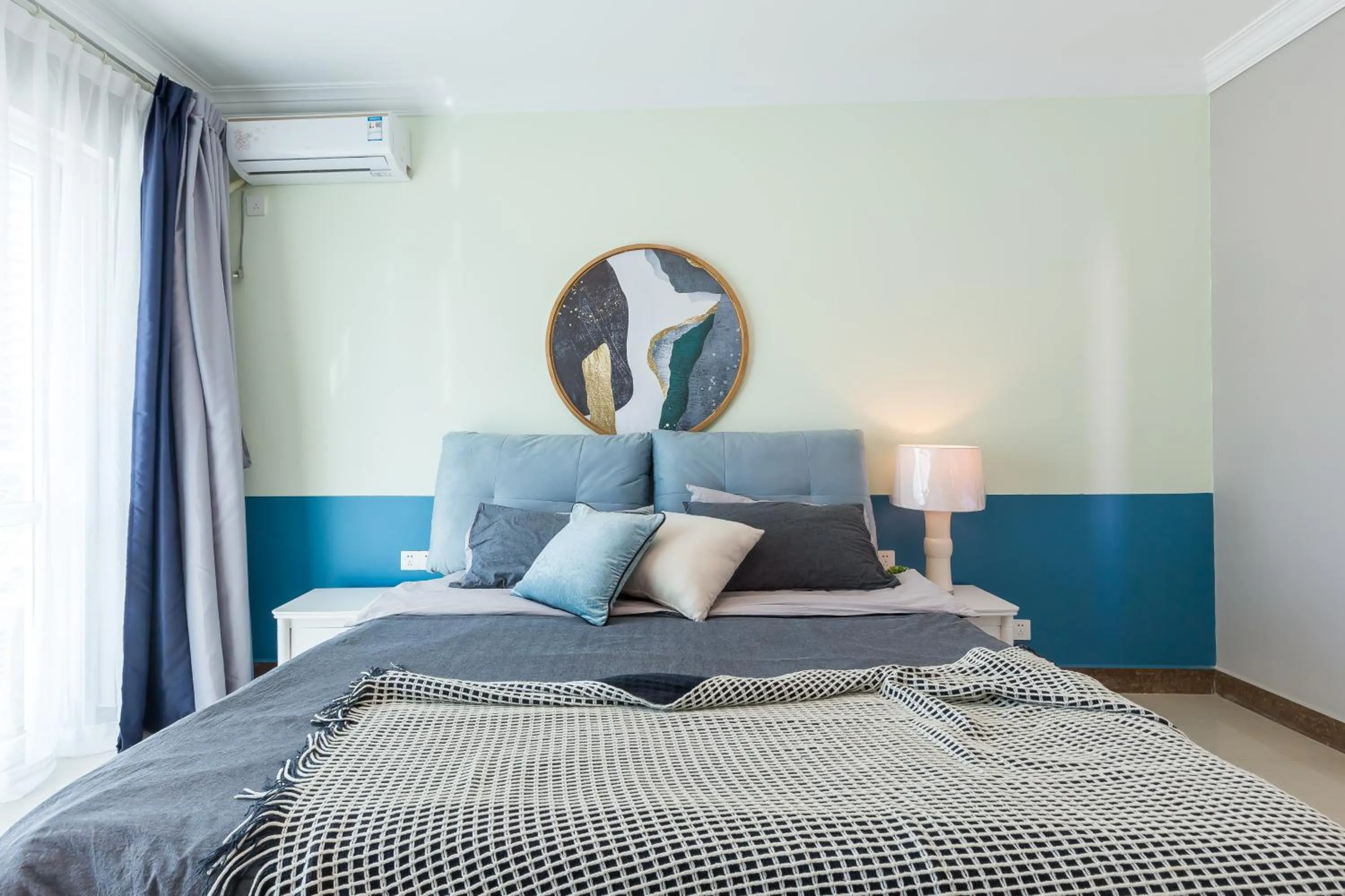 Bed in Sanya Sun Seaview Apartment