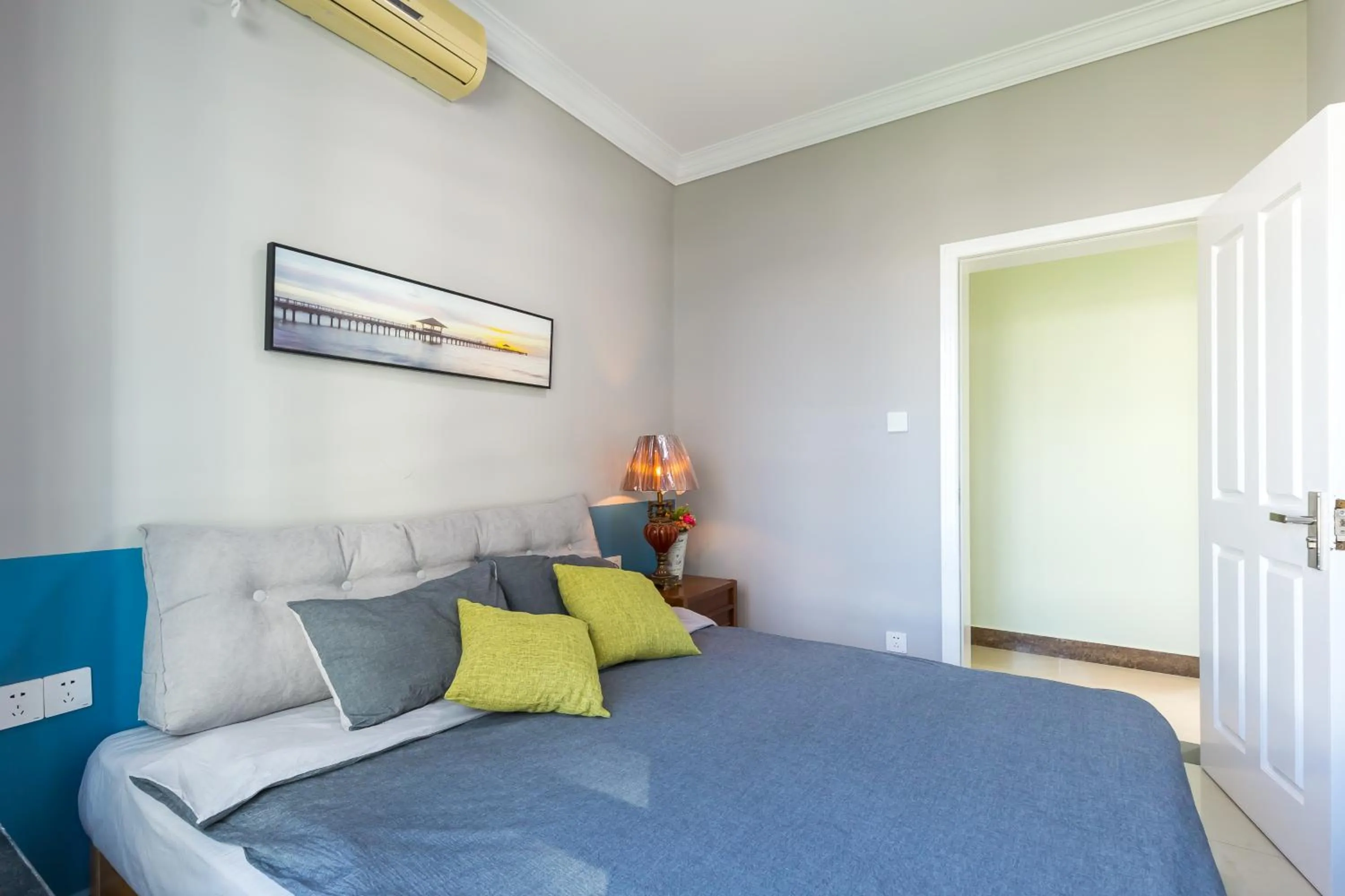 Bed in Sanya Sun Seaview Apartment