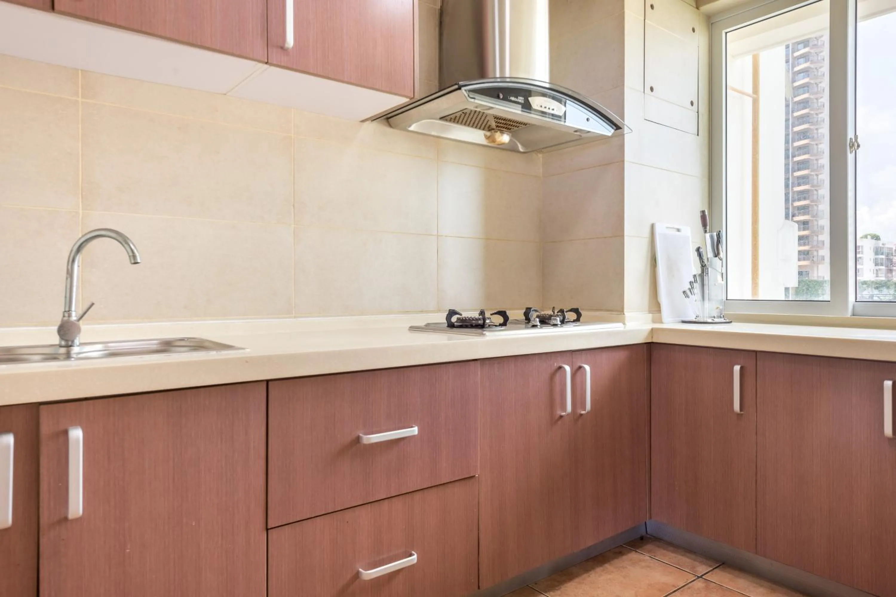 Kitchen or kitchenette in Sanya Sun Seaview Apartment