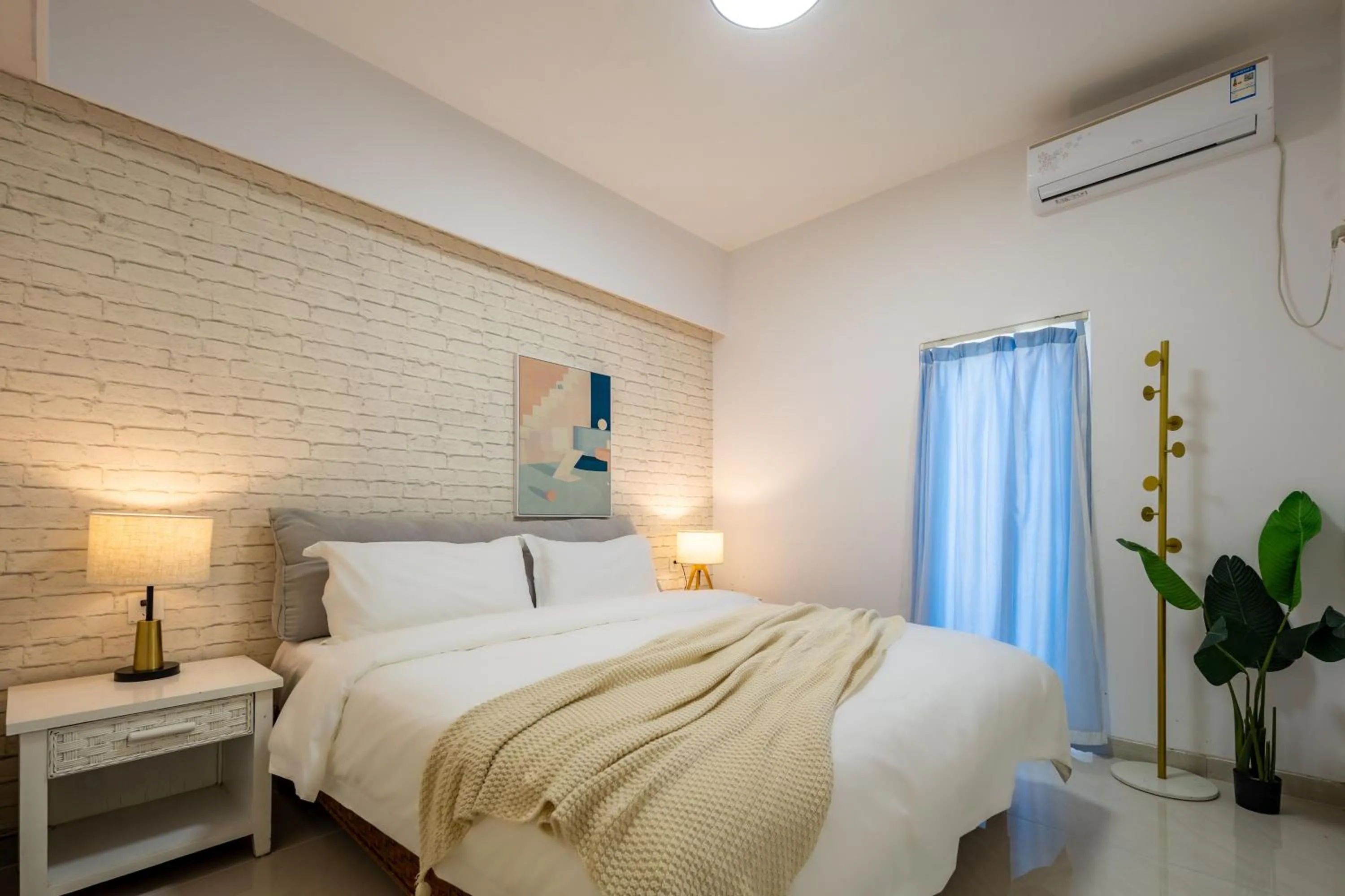 Bed in Sanya Sun Seaview Apartment