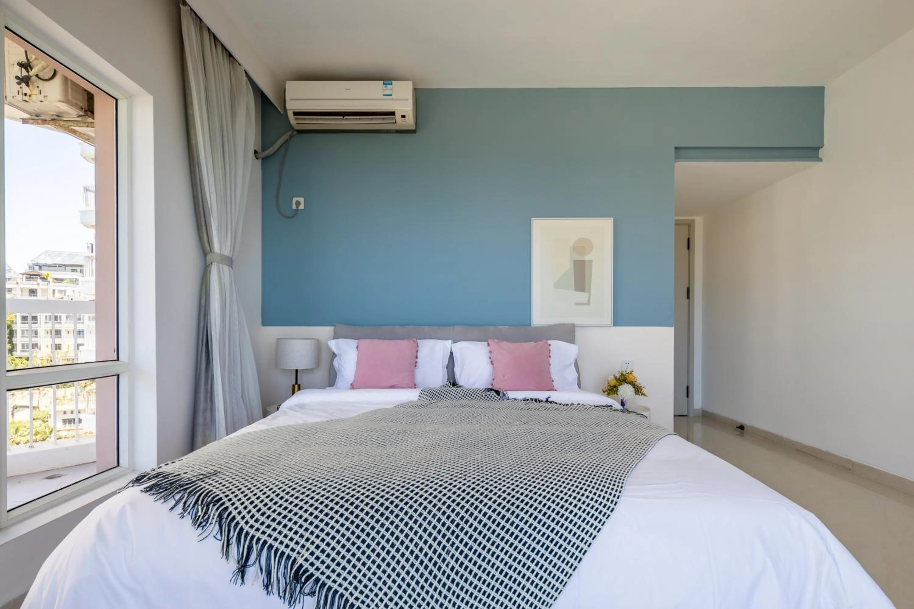 Bed in Sanya Sun Seaview Apartment