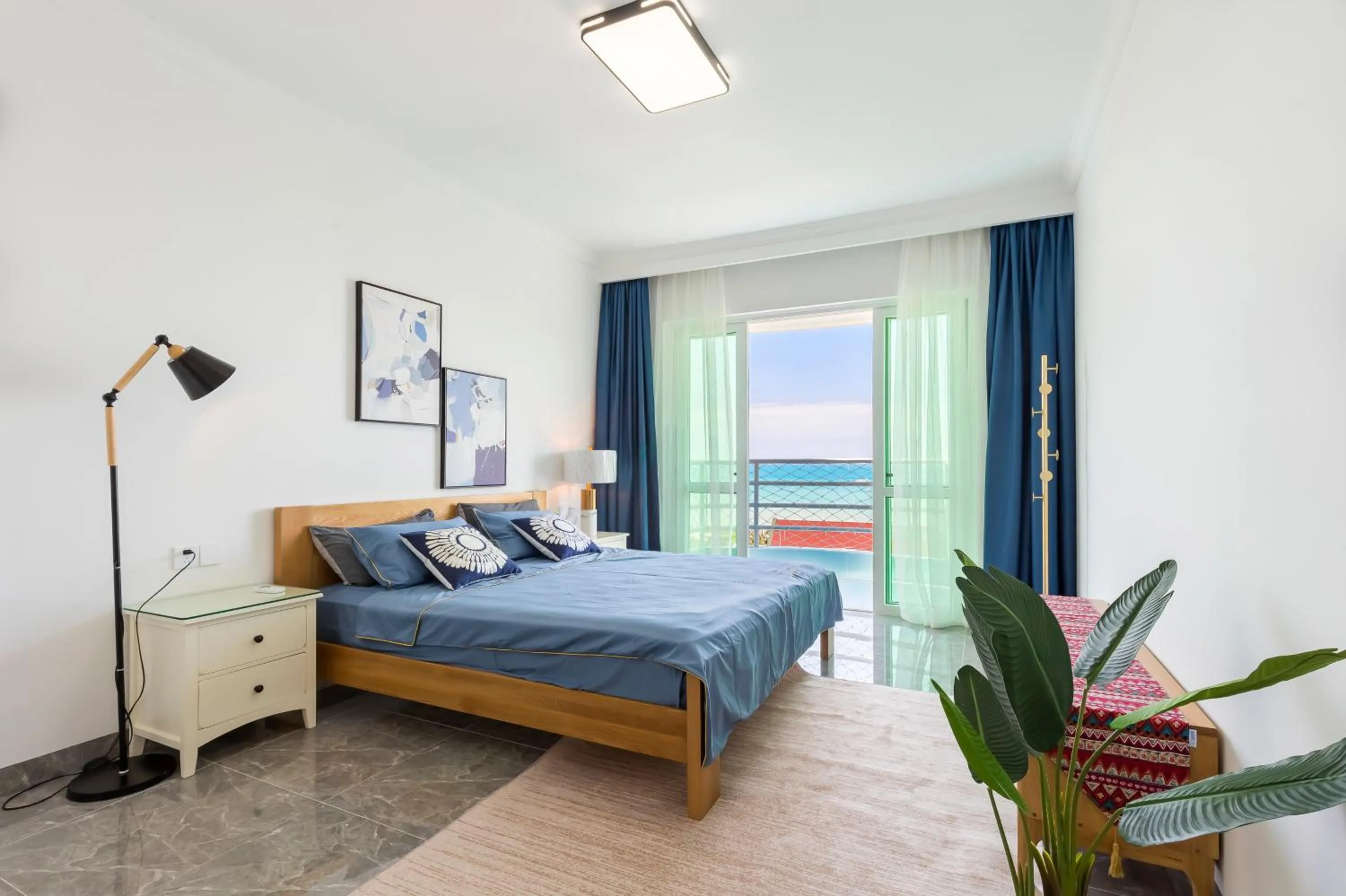 Bed in Sanya Sun Seaview Apartment