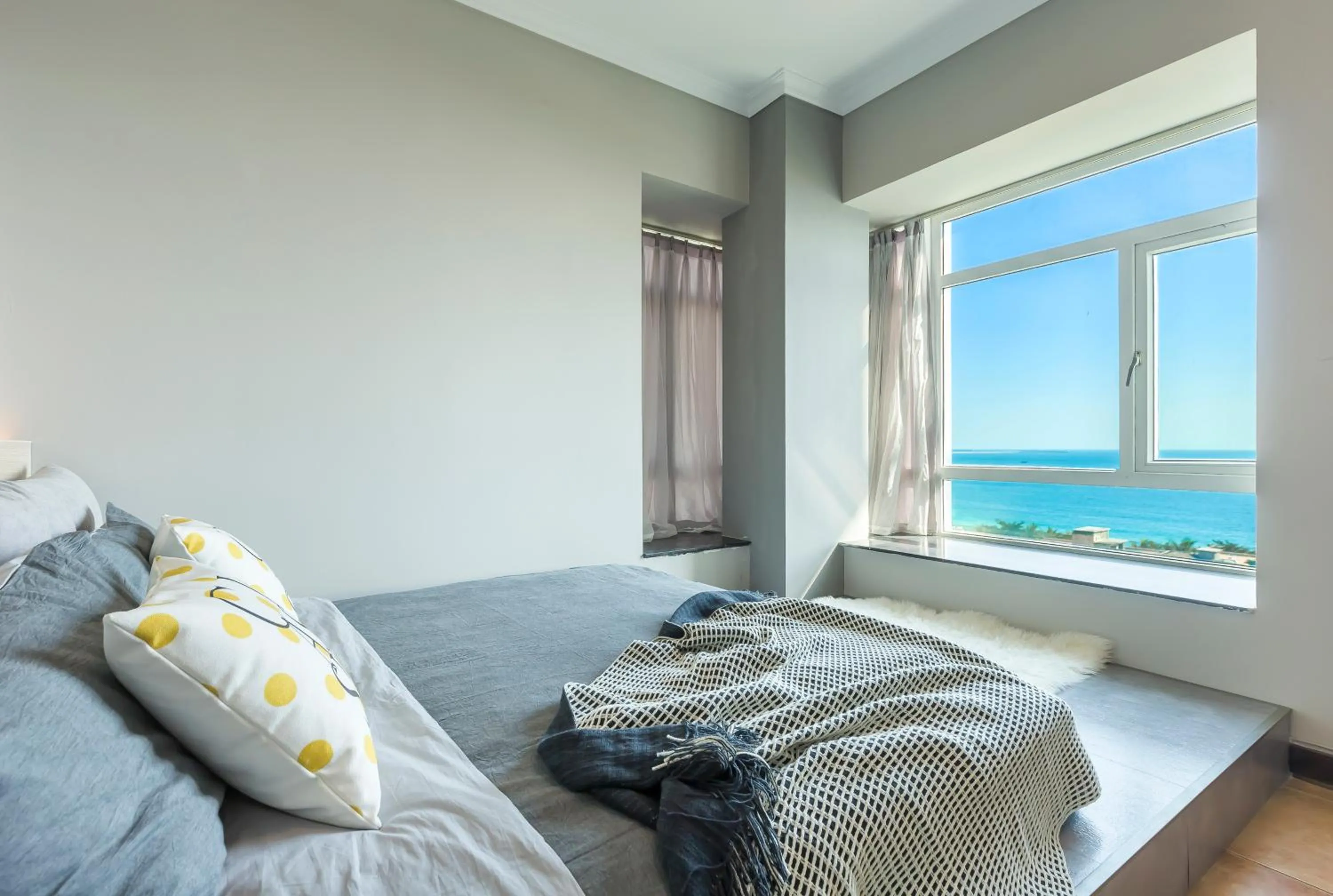 Bed in Sanya Sun Seaview Apartment
