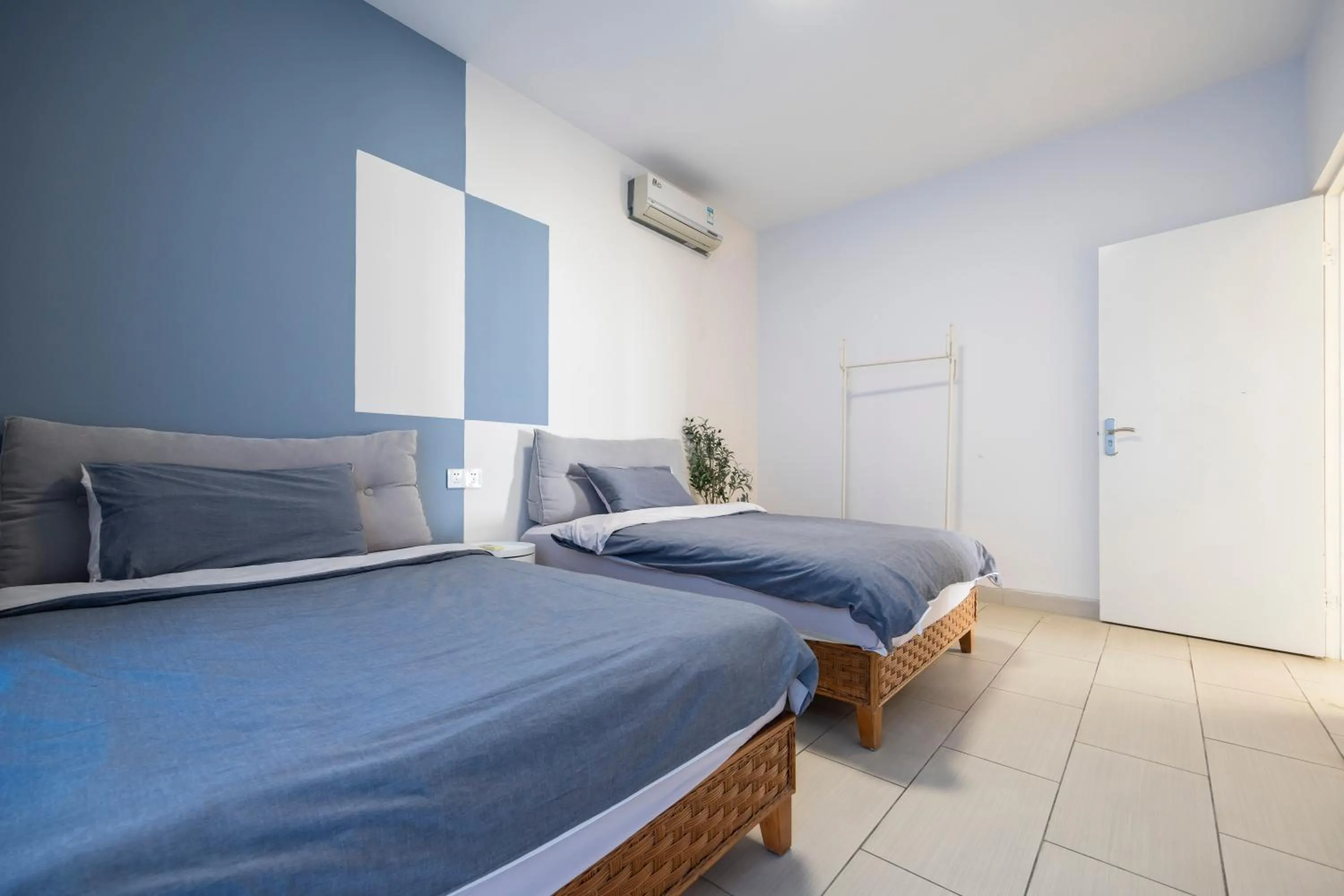 Bed in Sanya Sun Seaview Apartment