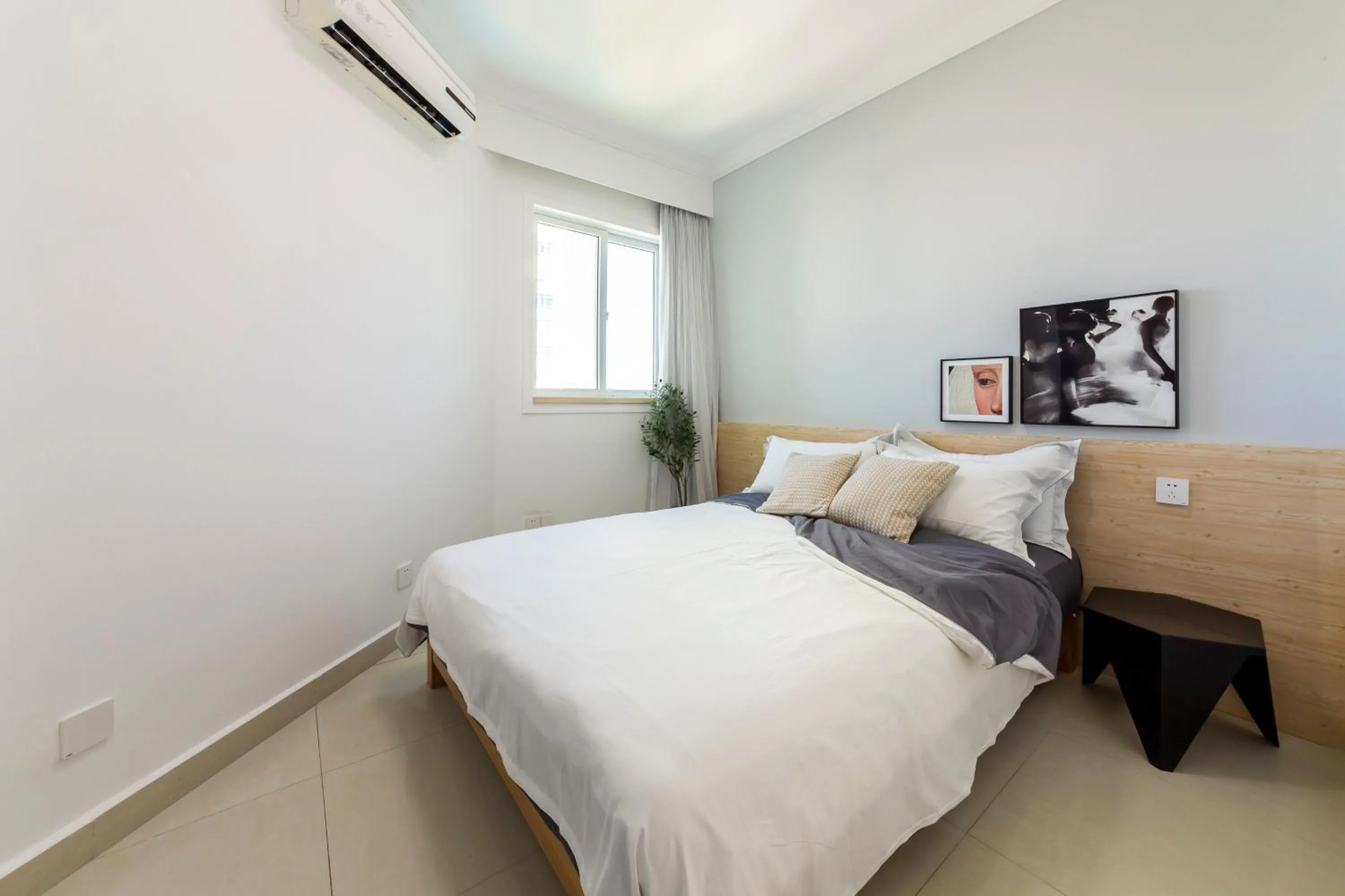Bed in Sanya Sun Seaview Apartment