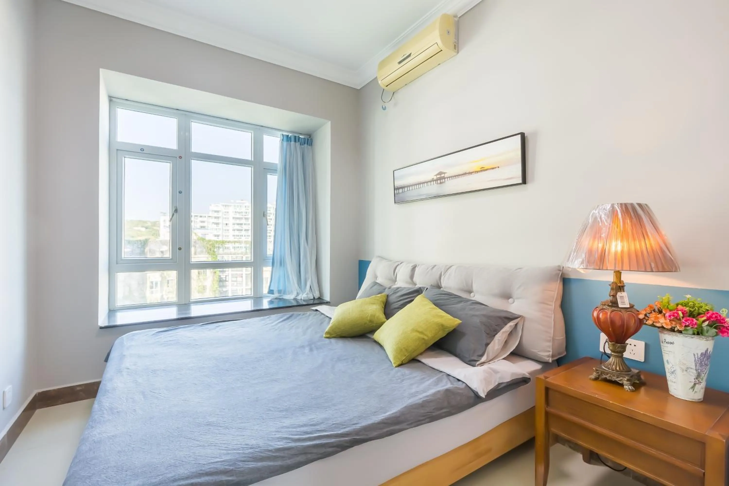 Bed in Sanya Sun Seaview Apartment