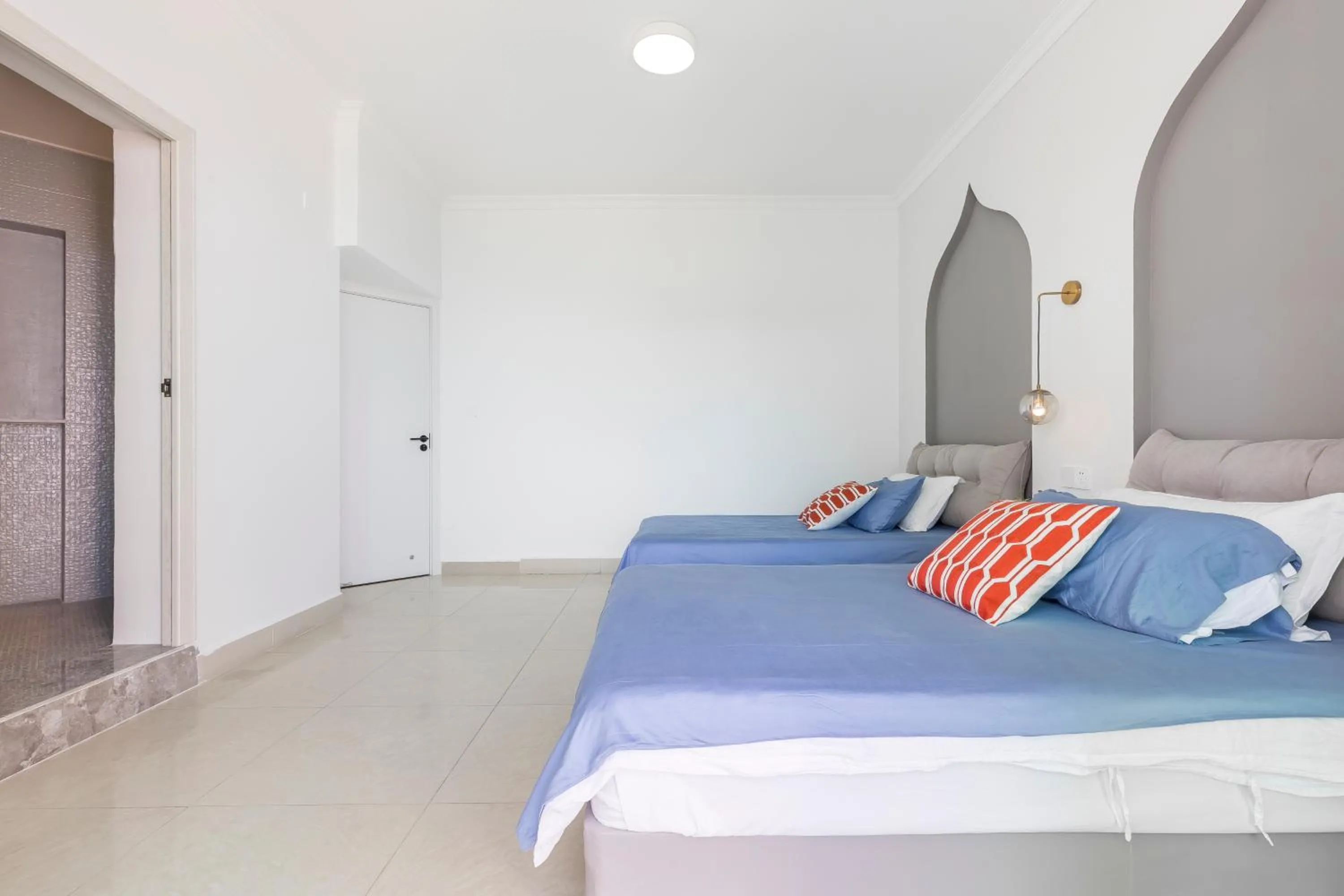 Bed in Sanya Sun Seaview Apartment