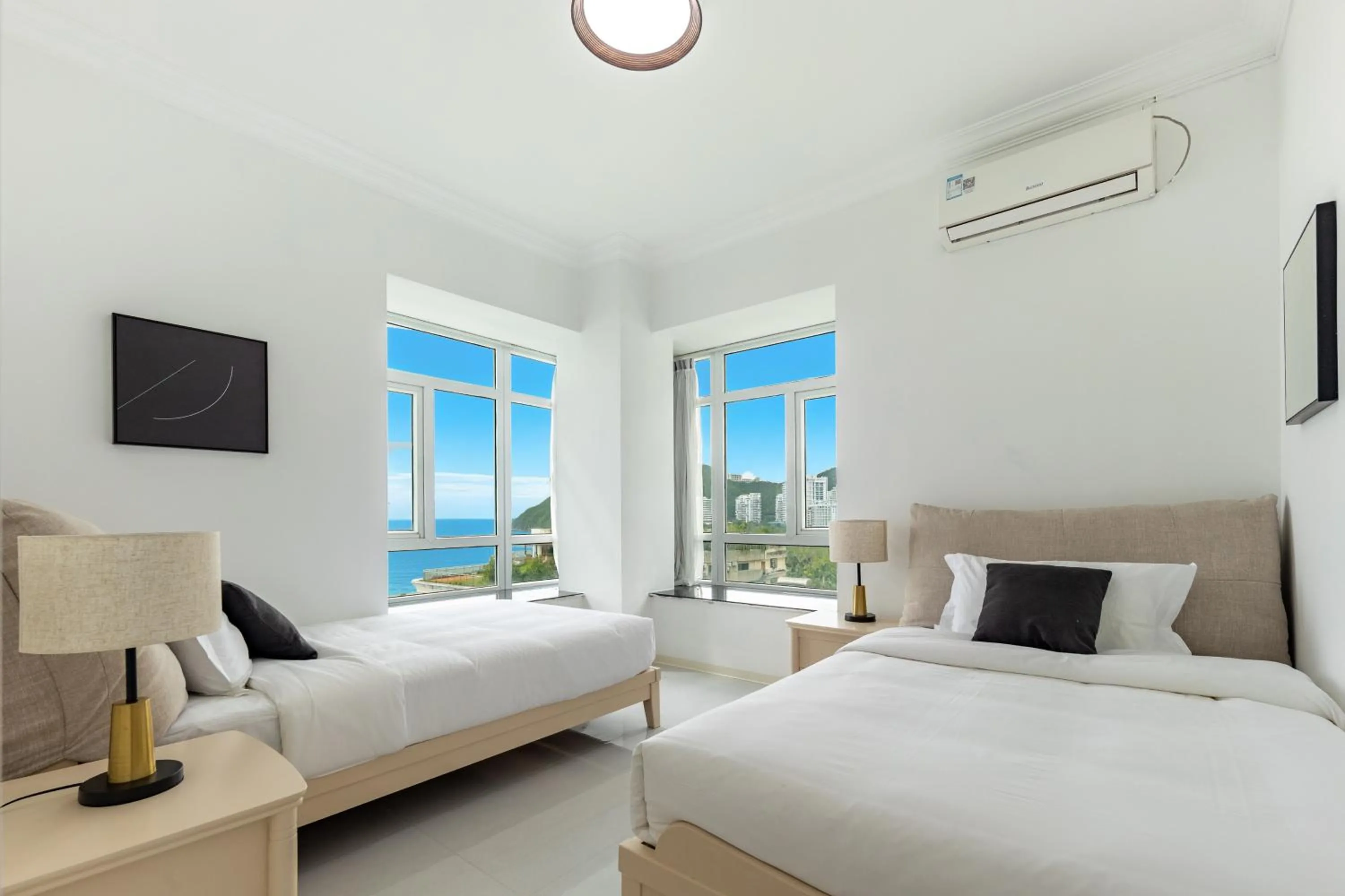 Bed in Sanya Sun Seaview Apartment